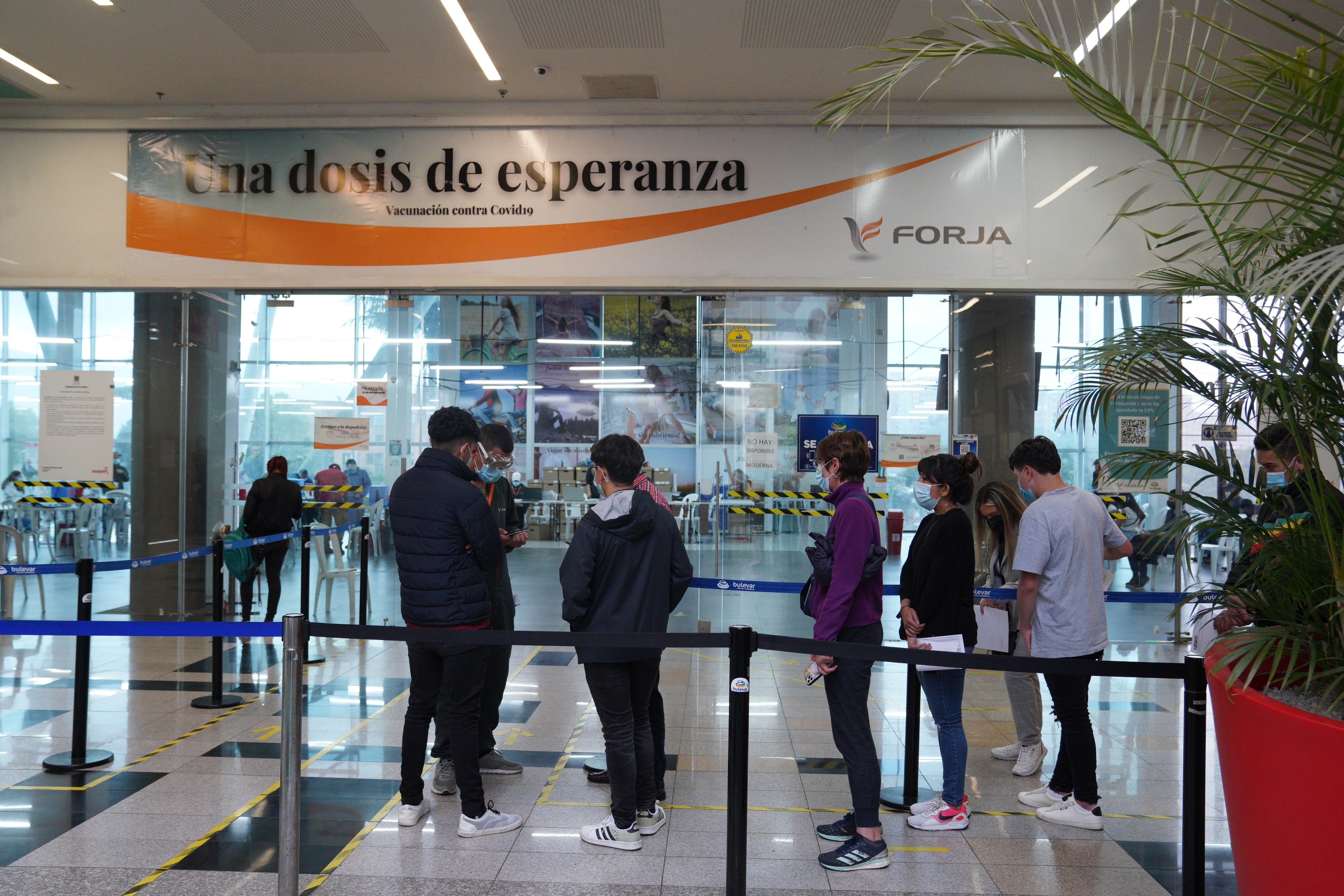 People line up outside a vaccination center in Bogota, Colombia on Sept 22.