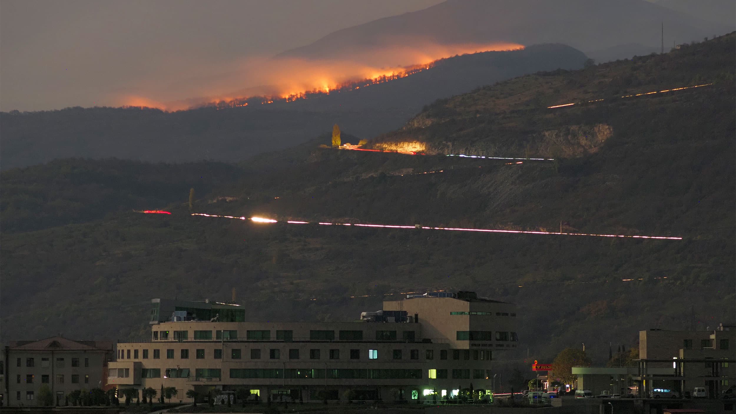 A forest burns in the mountains after shelling by Azerbaijan's artillery during a military conflict outside Stepanakert, the separatist region of Nagorno-Karabakh