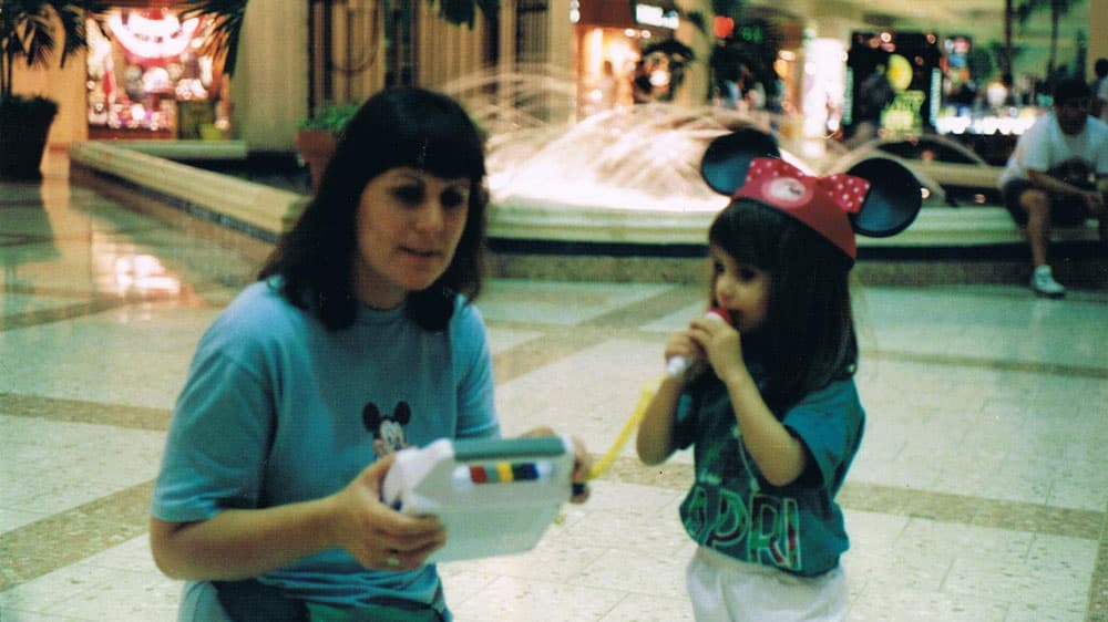 Lucía, age 3, records herself on a tape recorder with the help of her mother, Ida.