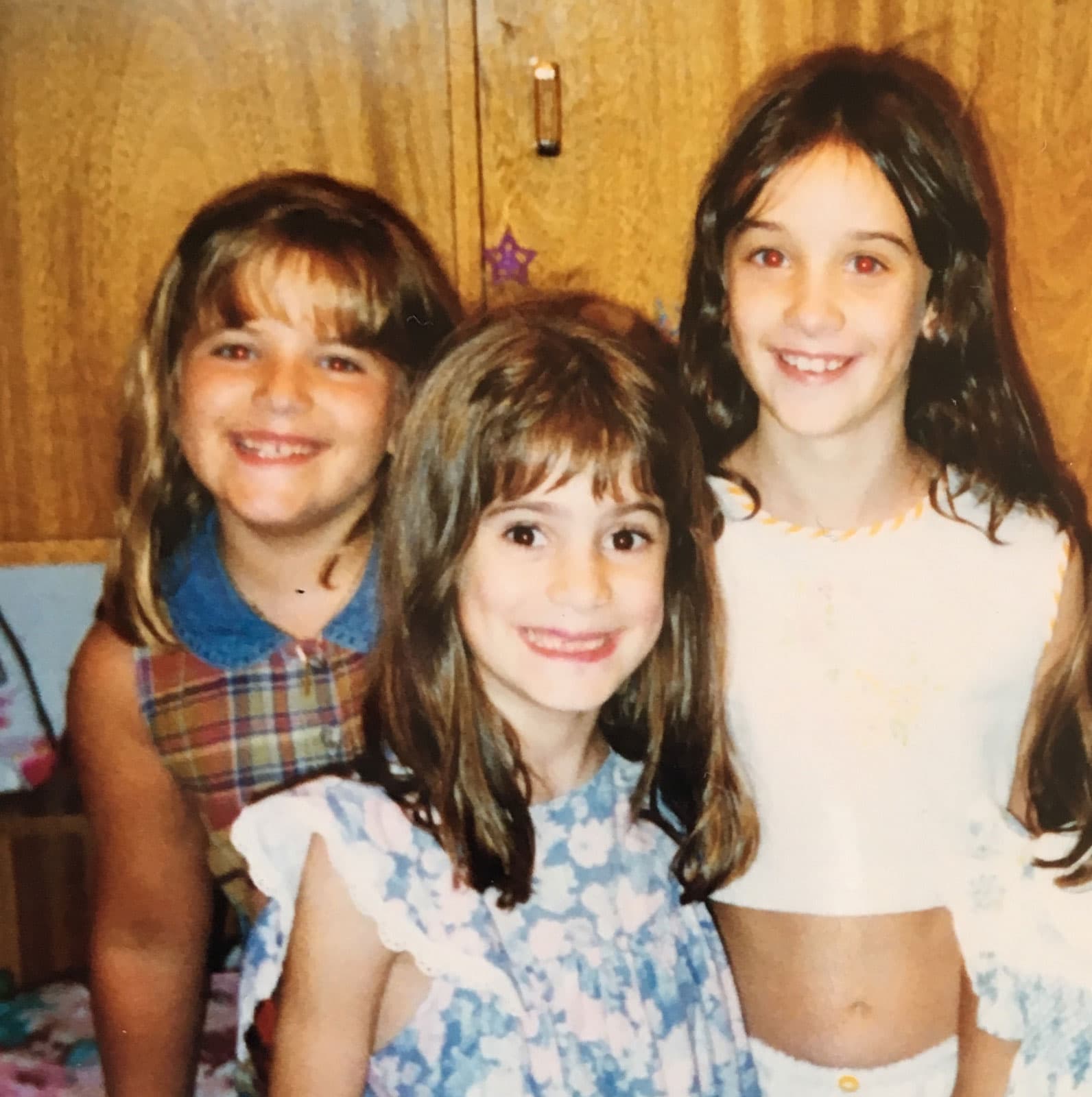 Lucía with Agustina, right, with whom she recorded a fake radio show, along with another childhood friend.