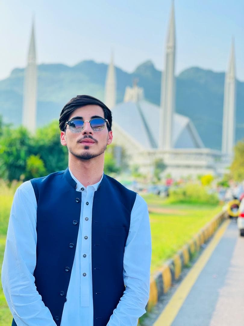 Anwar, pictured above in Islamabad, Pakistan, after he fled Kabul when the Taliban took over the American University of Afghanistan where he studied.