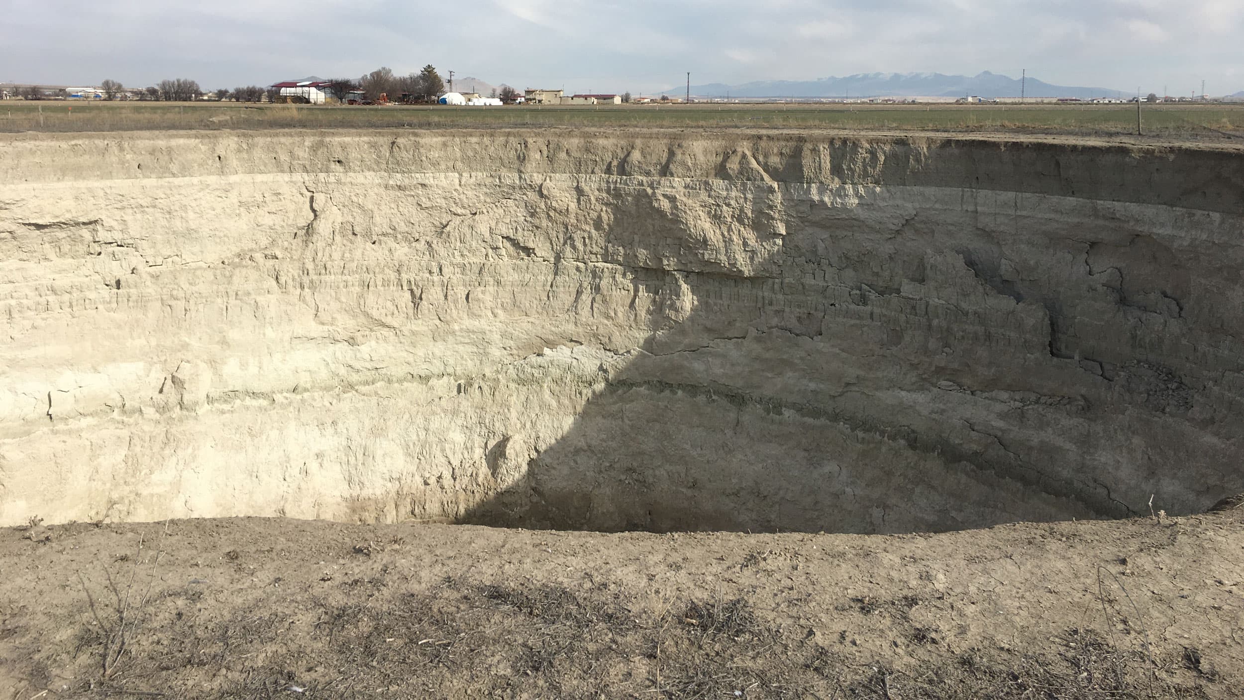 A massive sinkhole in central Turkey is attributed to a three-year drought and climate change.