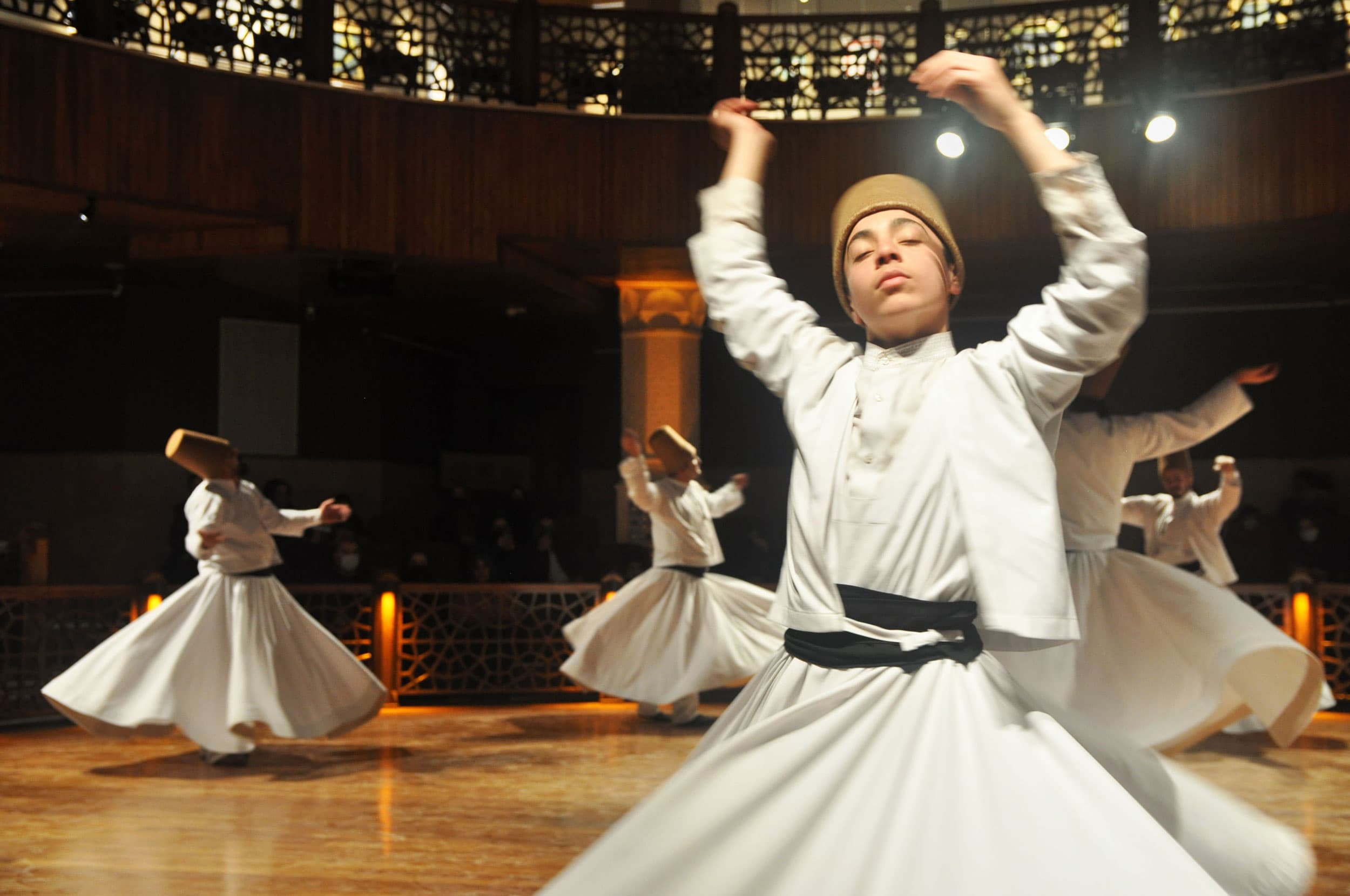A young semazen during a sema ritual at the Irfan Civilization Research and Culture Center in Konya, Turkey. There is no age limit to learn the ritual, and some who do it publicly begin at an early age.