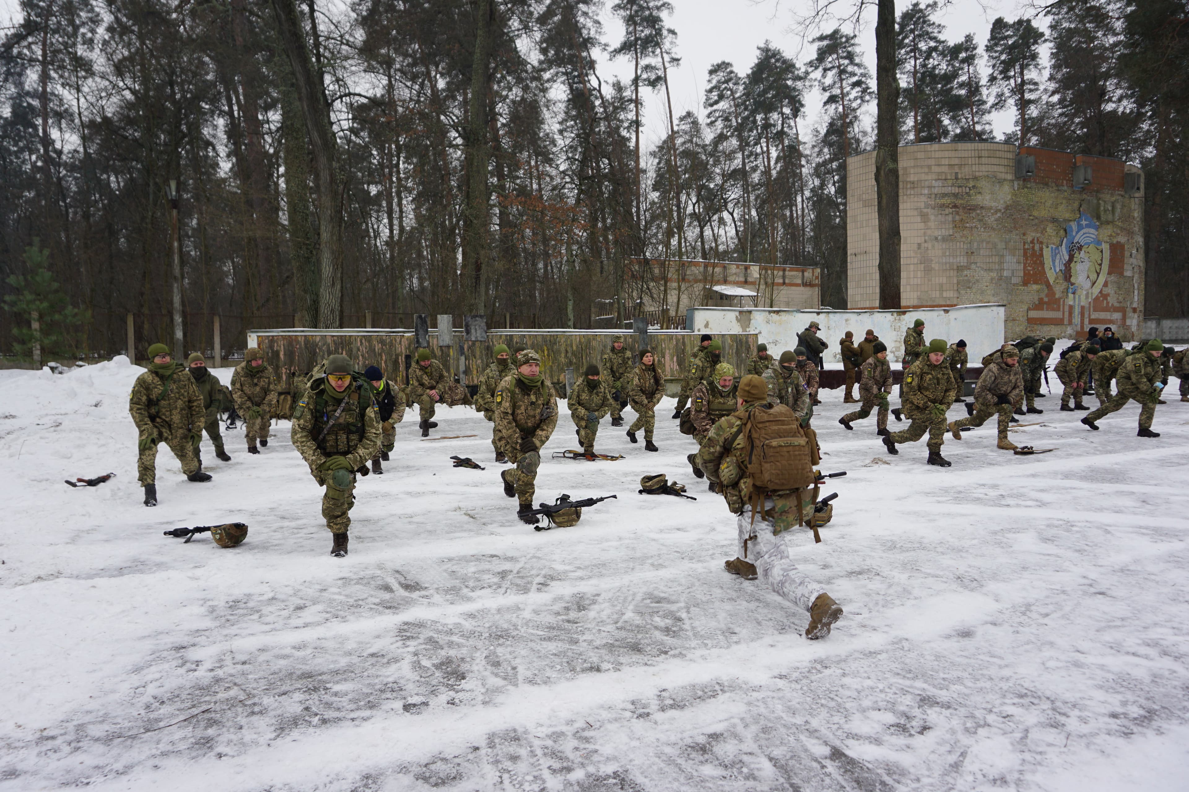 At a “territorial defense training” on the outskirts of Kyiv, Ukraine, civilian volunteers learn military skills from reservist officers.