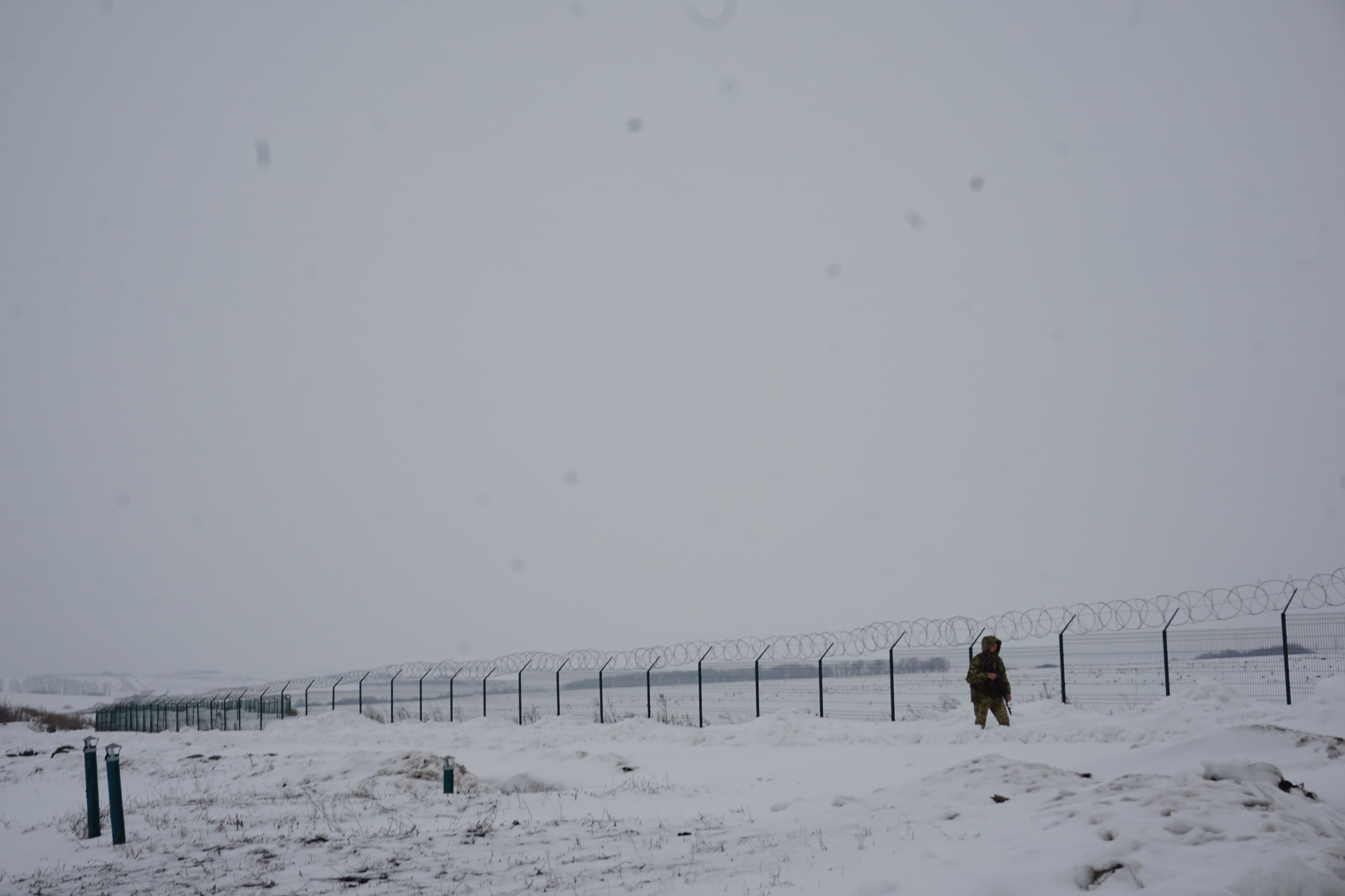 Not far outside of the city, Ukrainian military forces are preparing for the worst. There’s a long-barbed wire fence separating Ukraine and Russia. Some 50 yards back, there’s an intricate system of trenches.