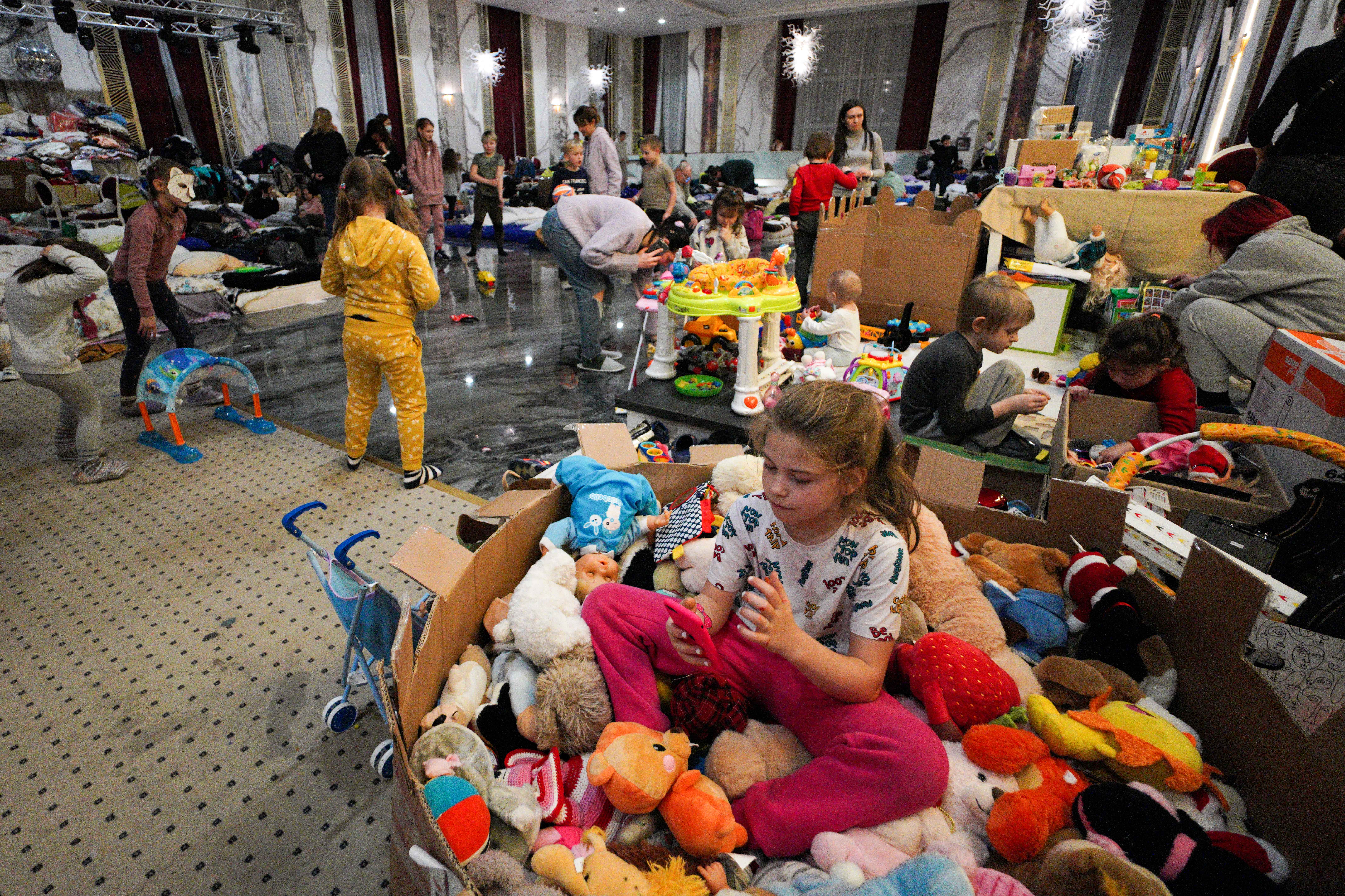 In the town of Suceava, Romania, the Mandachi Hotel and Spa, a four-star hotel converted its ballroom into a temporary shelter, serving food and other supplies to Ukrainian refugees.