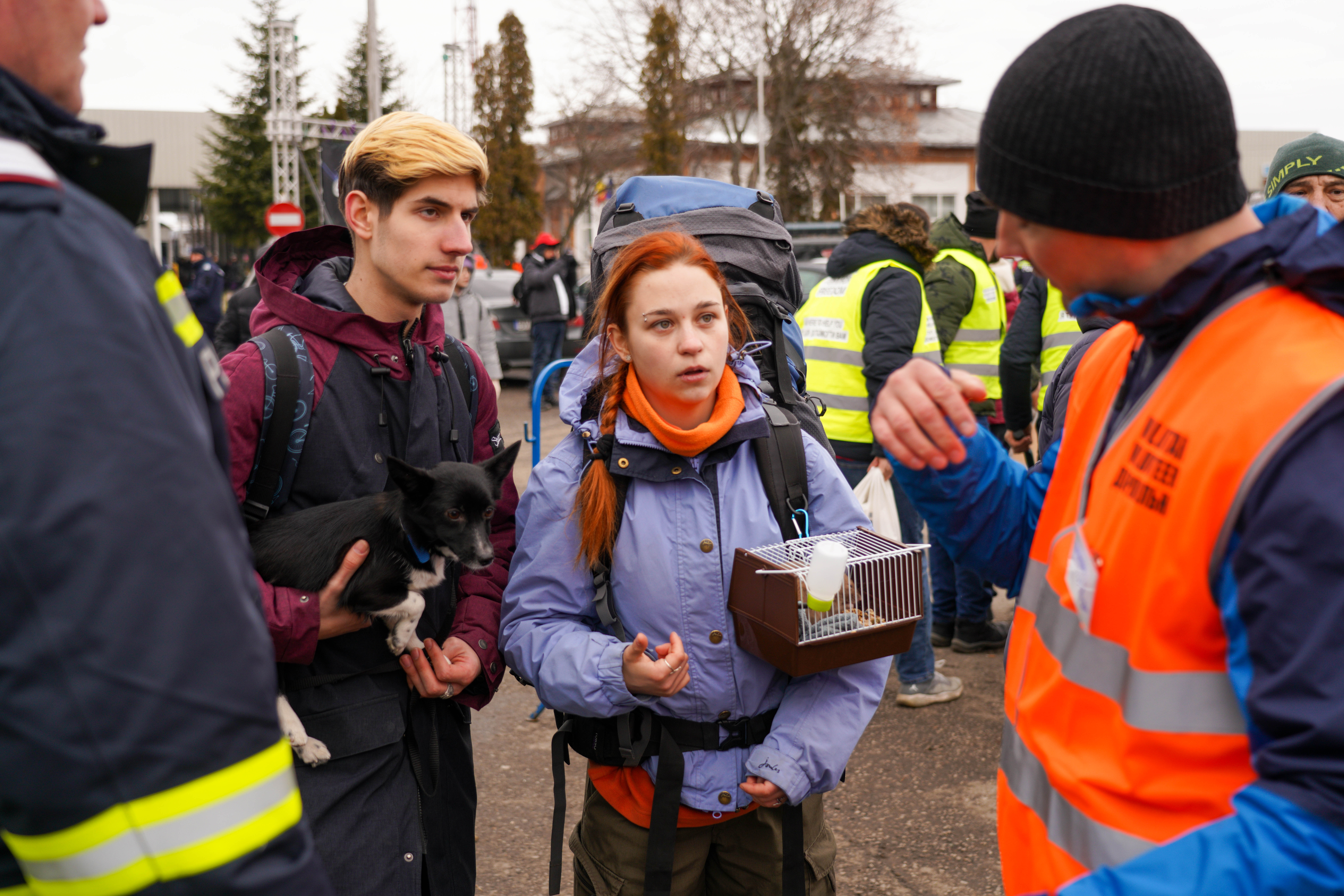 Ukrainian refugees arrive across the border to Siret customs at the crossing point near the town of Suceava, in northern Romania.
