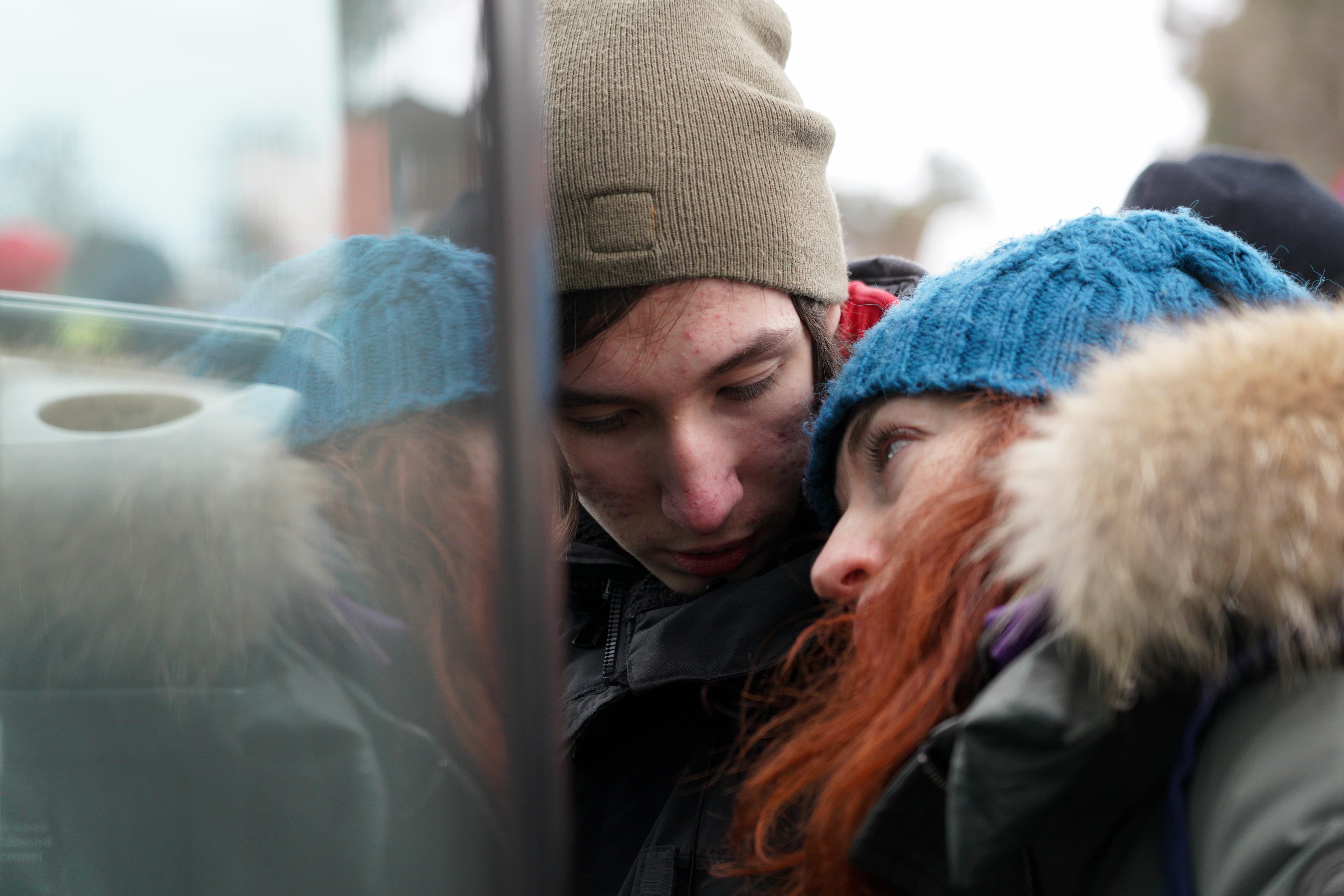 Ukrainian refugees are shown at Siret customs at the border crossing point near the town of Suceava, in northern Romania.