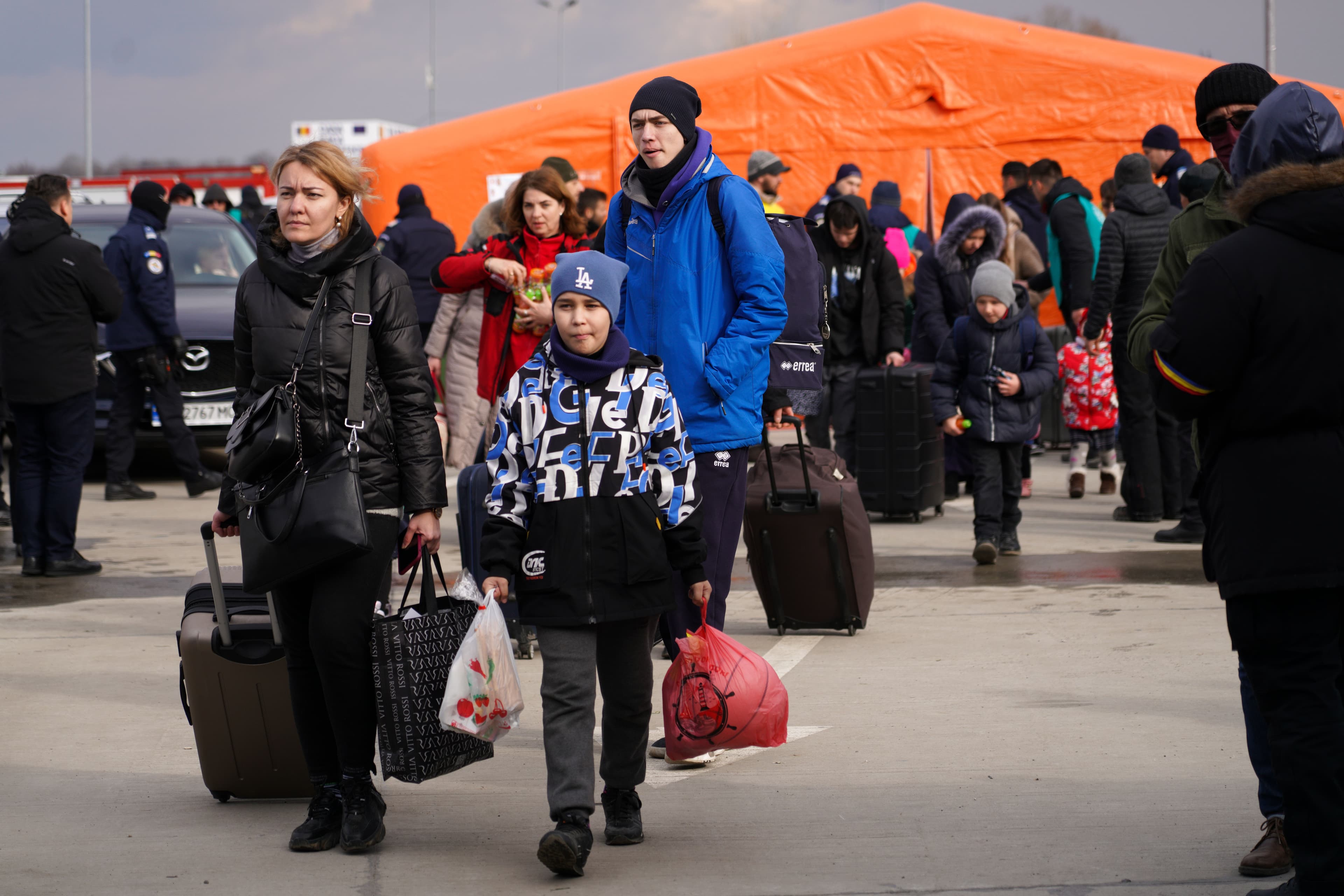 Every few hours, a boat full of people and cars makes its way across the Danube River to customs in Isaccea, on Romania's southern border.