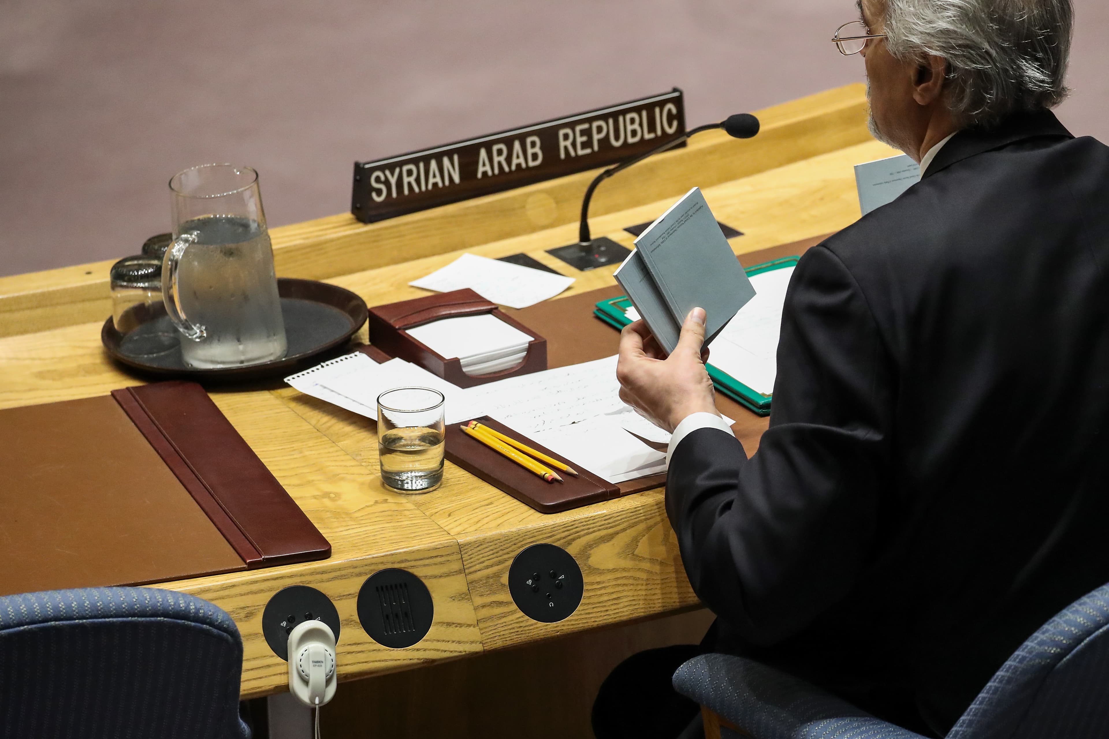 Diplomats like Syrian ambassador Bashar Jaafari, pictured here at the U.N. in 2018, have been known to brandish the U.N. Charter to emphasize their points during speeches.