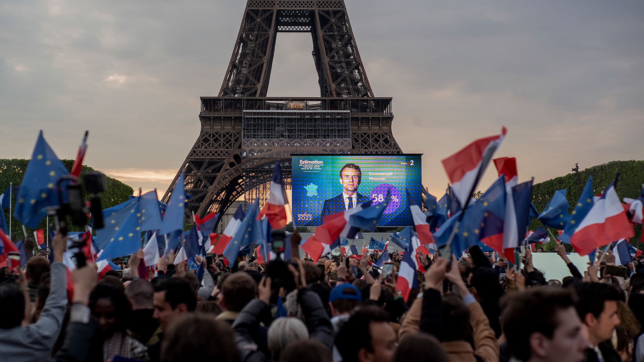 French President Emmanuel Macron celebrates with supporters in front of the Eiffel Tower Paris, France