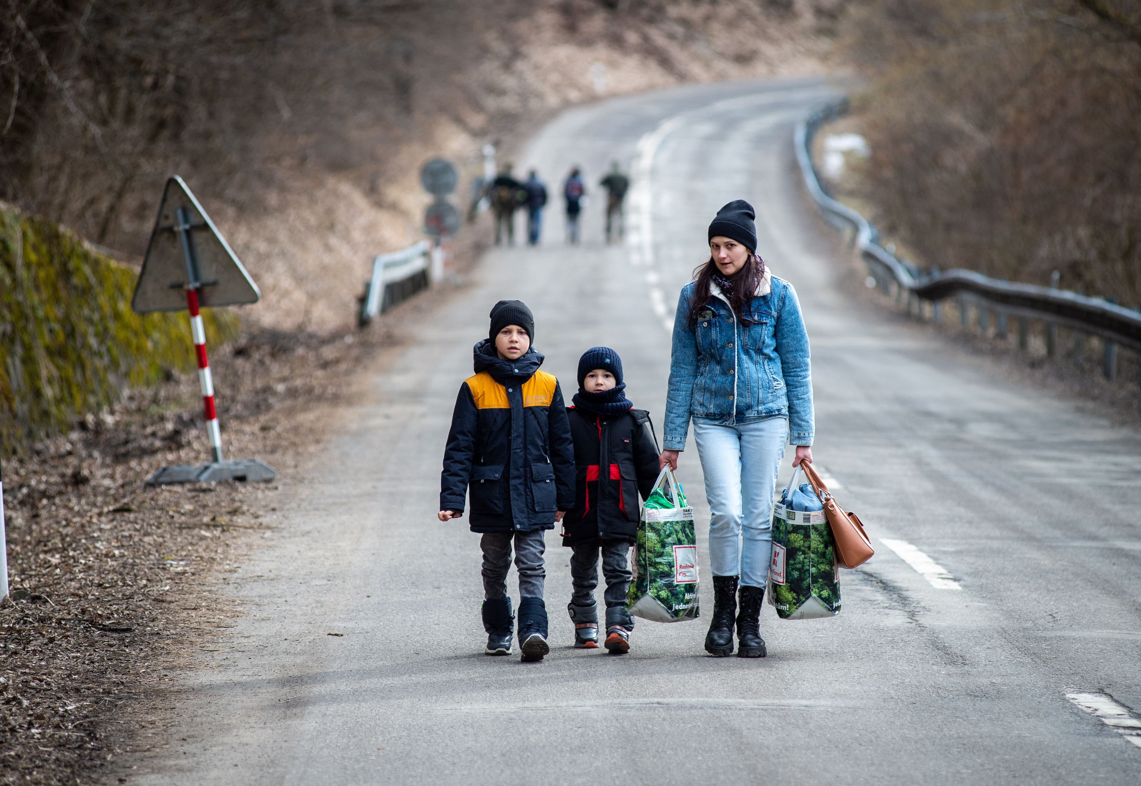A Ukrainian family crosses into Slovakia on Feb. 25, 2022.