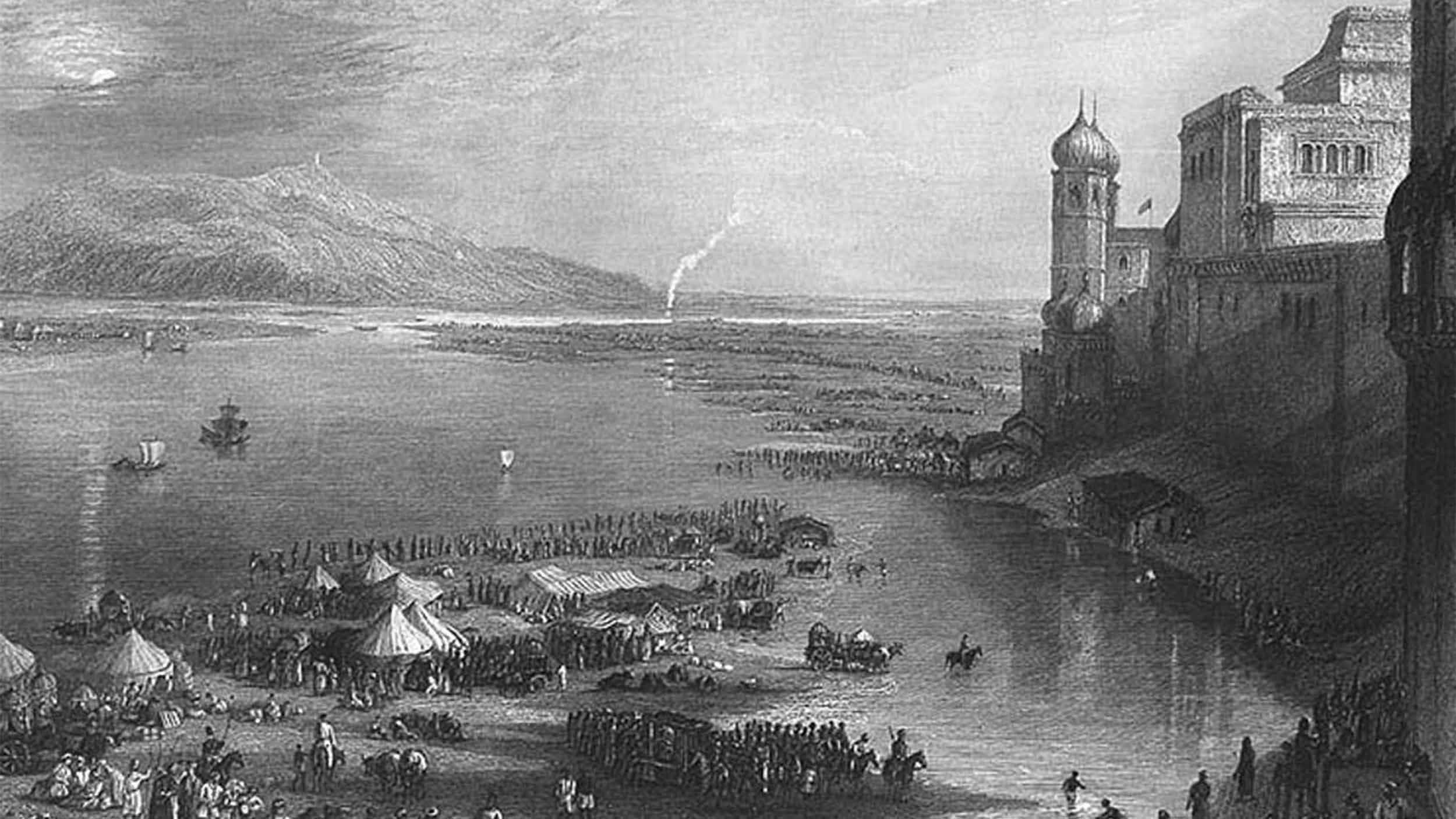 Colonial-era image of people gathered around river in India