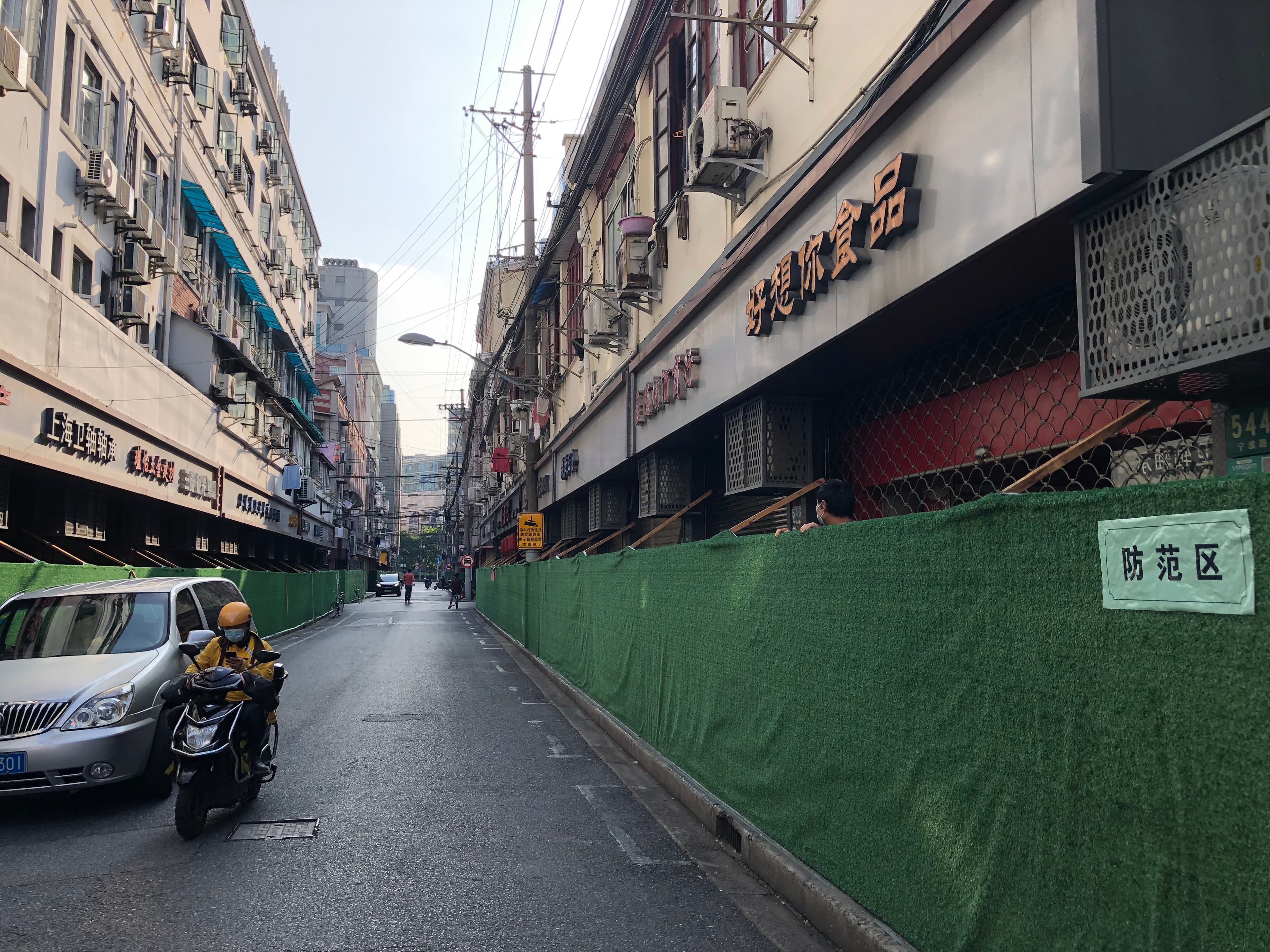 The empty, boarded-up streets of Shanghai during the financial hub's two-month COVID-19 lockdown.