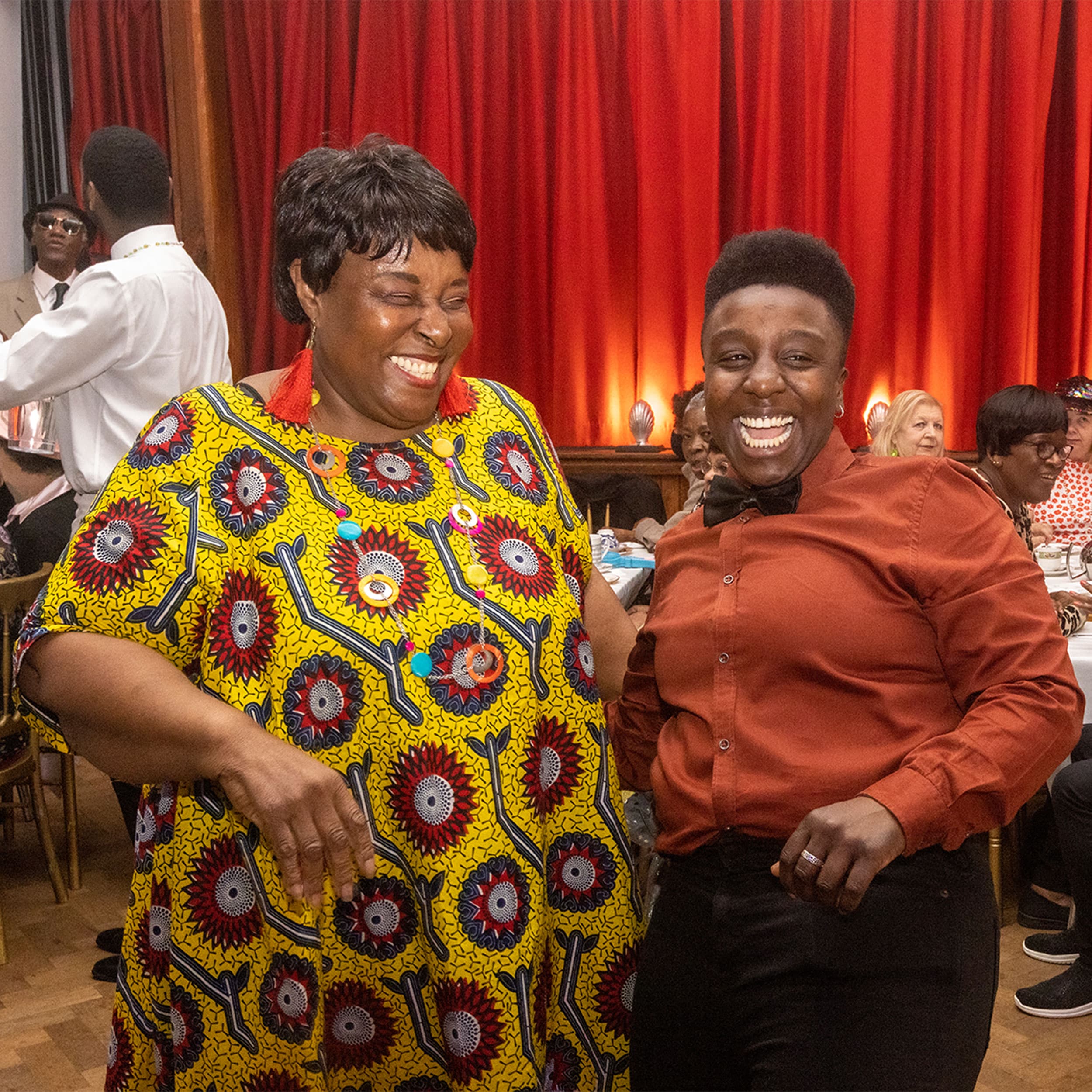 Hackney club host Azara Meghie laughs with her mother Lorna, a Posh Club regular.