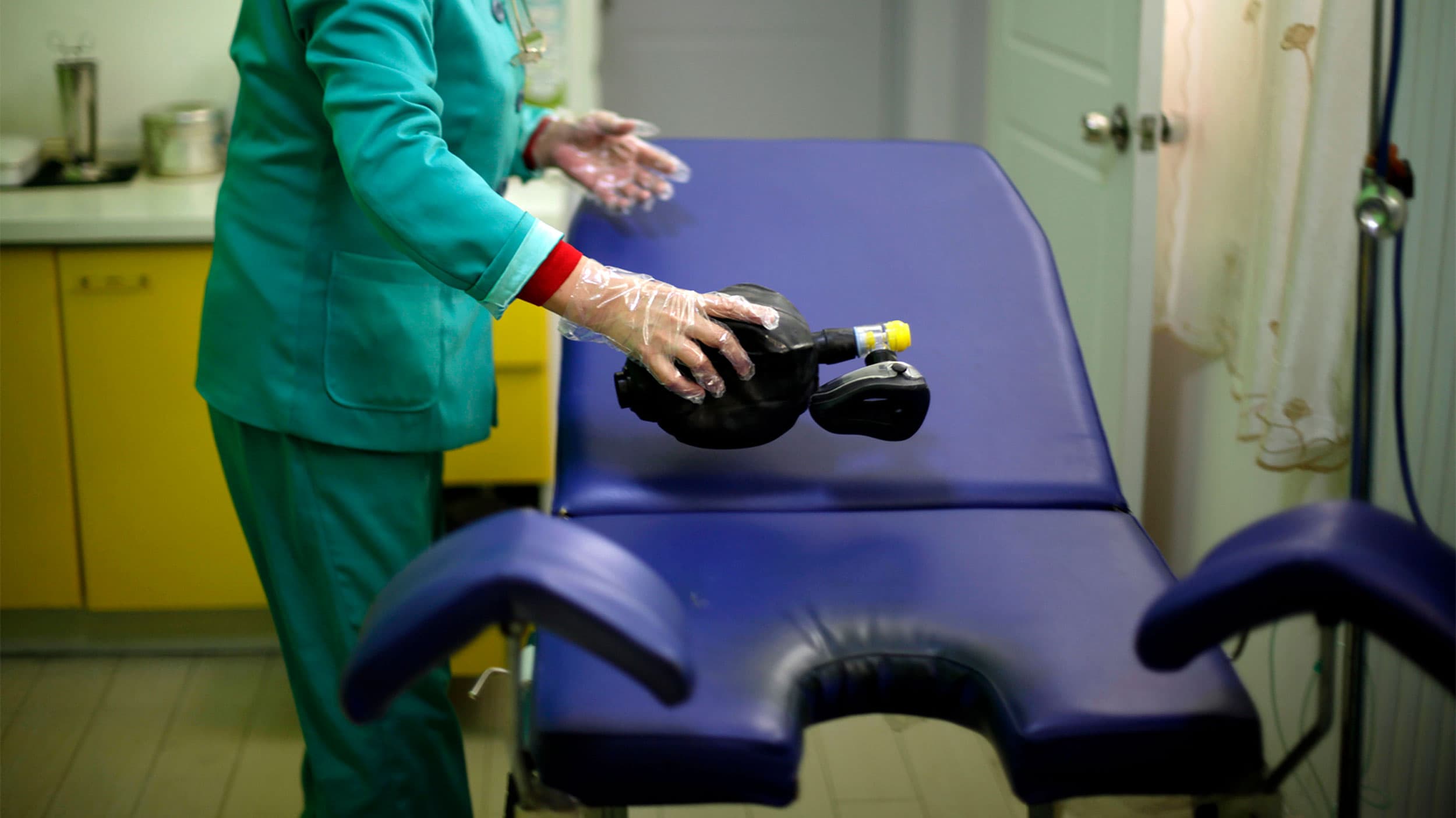 Anesthesiologist Liu Jianmin prepares for an abortion at a clinic run by Marie Stopes International in Xi'an in central China's Shaanxi province