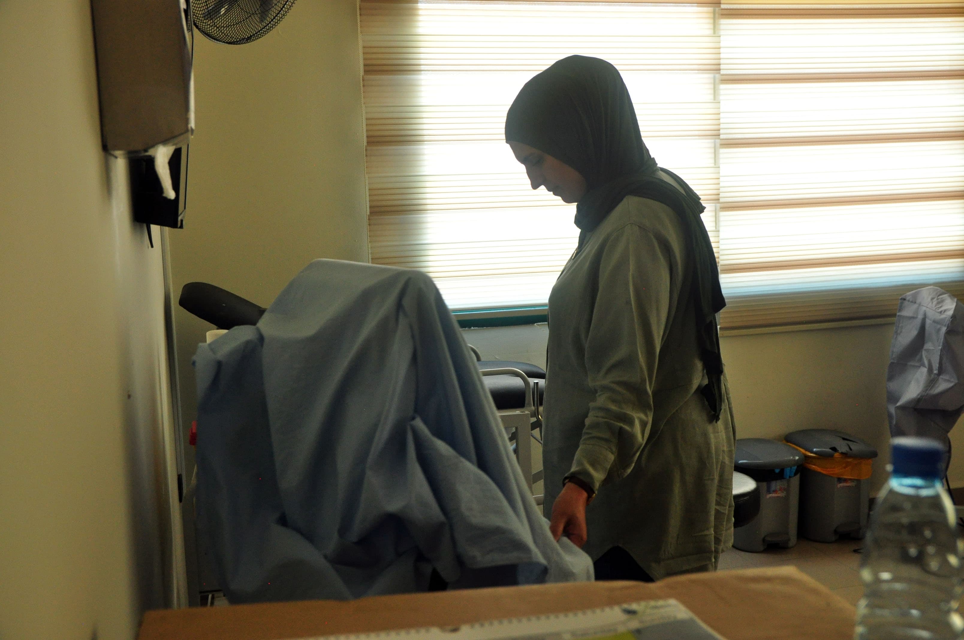 woman near a machine