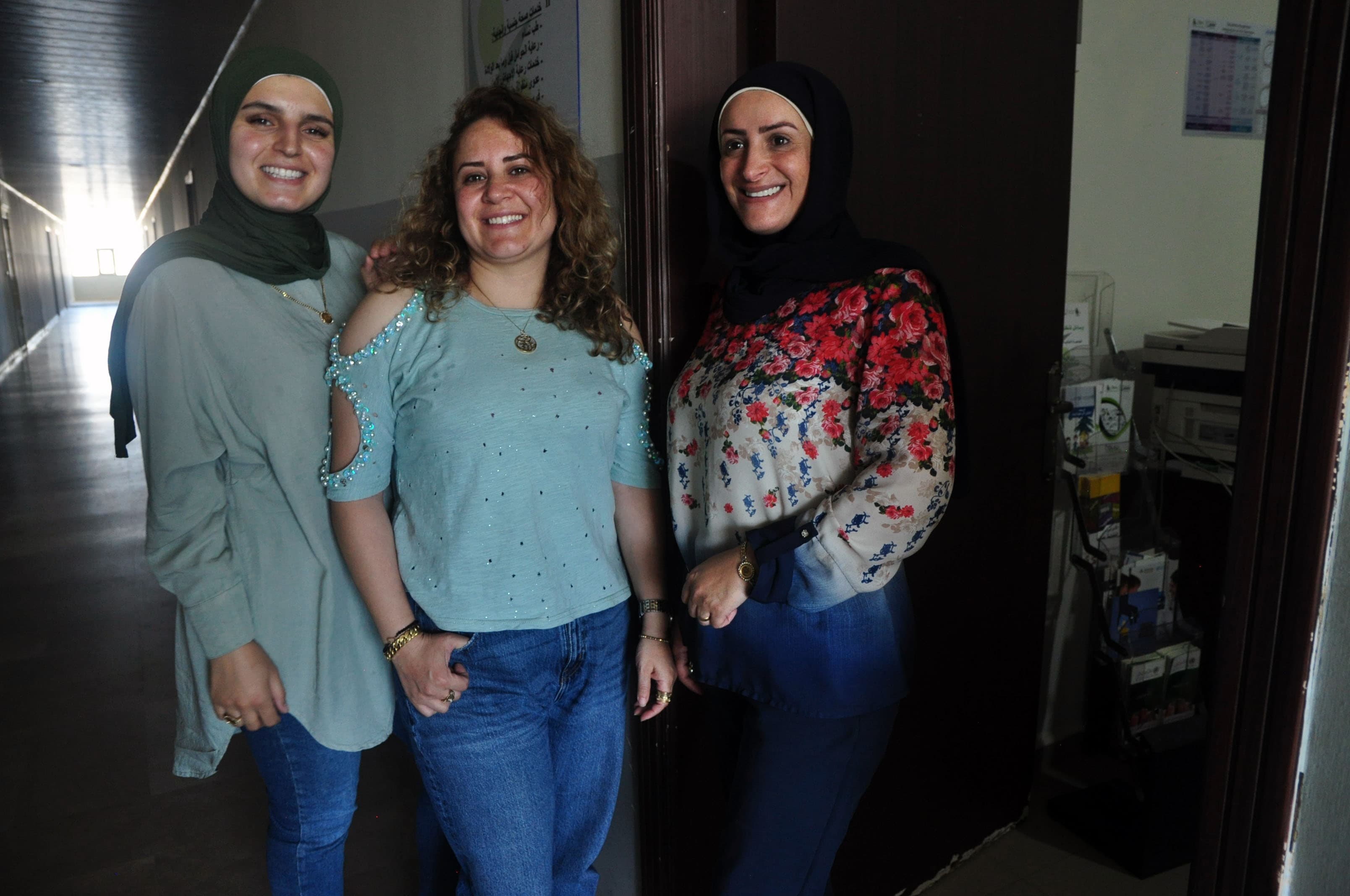 three women standing together