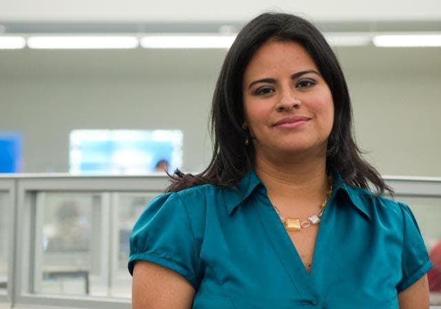 woman with aqua-colored shirt