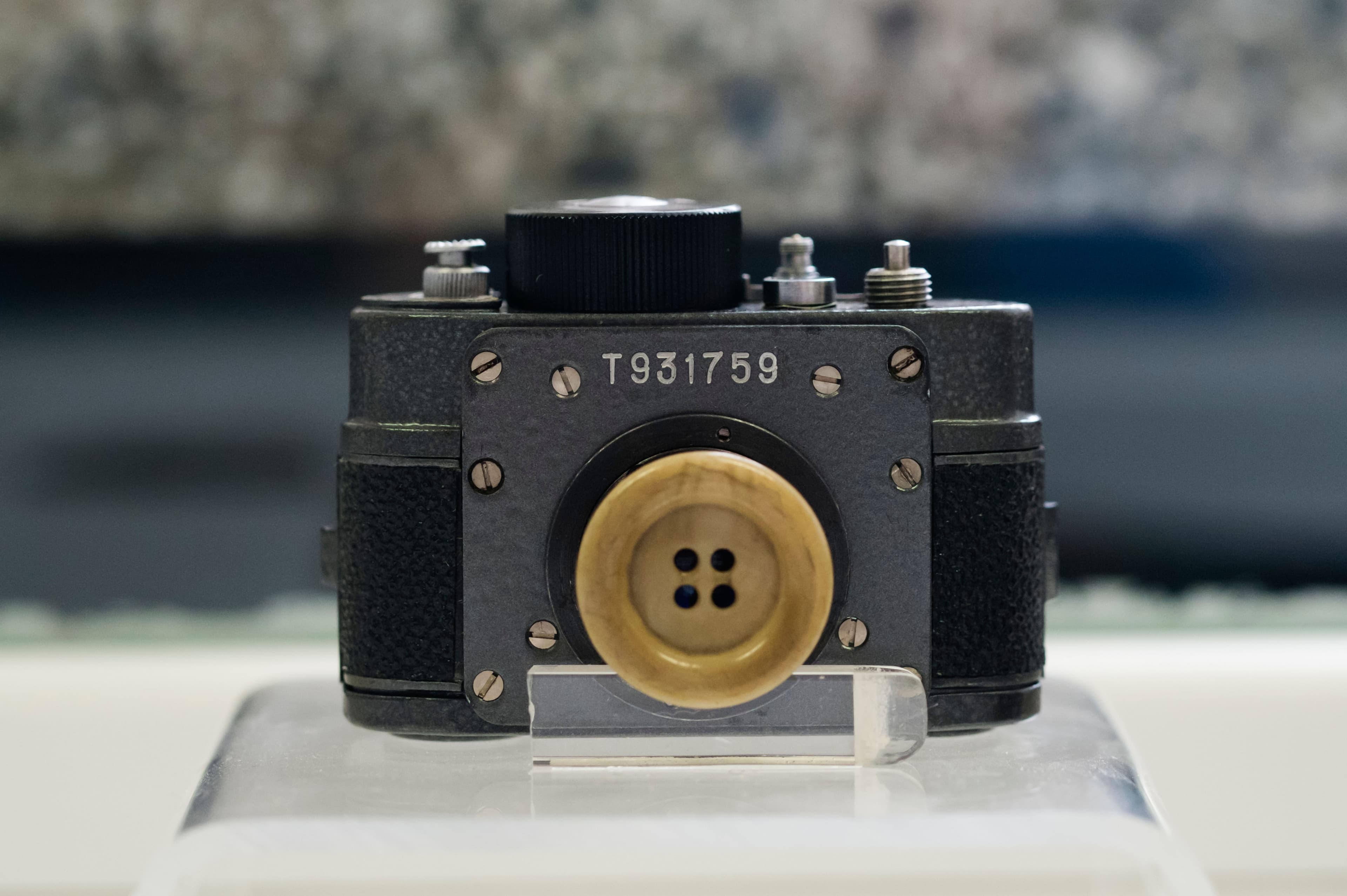 Button spy camera on display at offices of East German secret Police (STASI) Museum in Berlin, Germany.