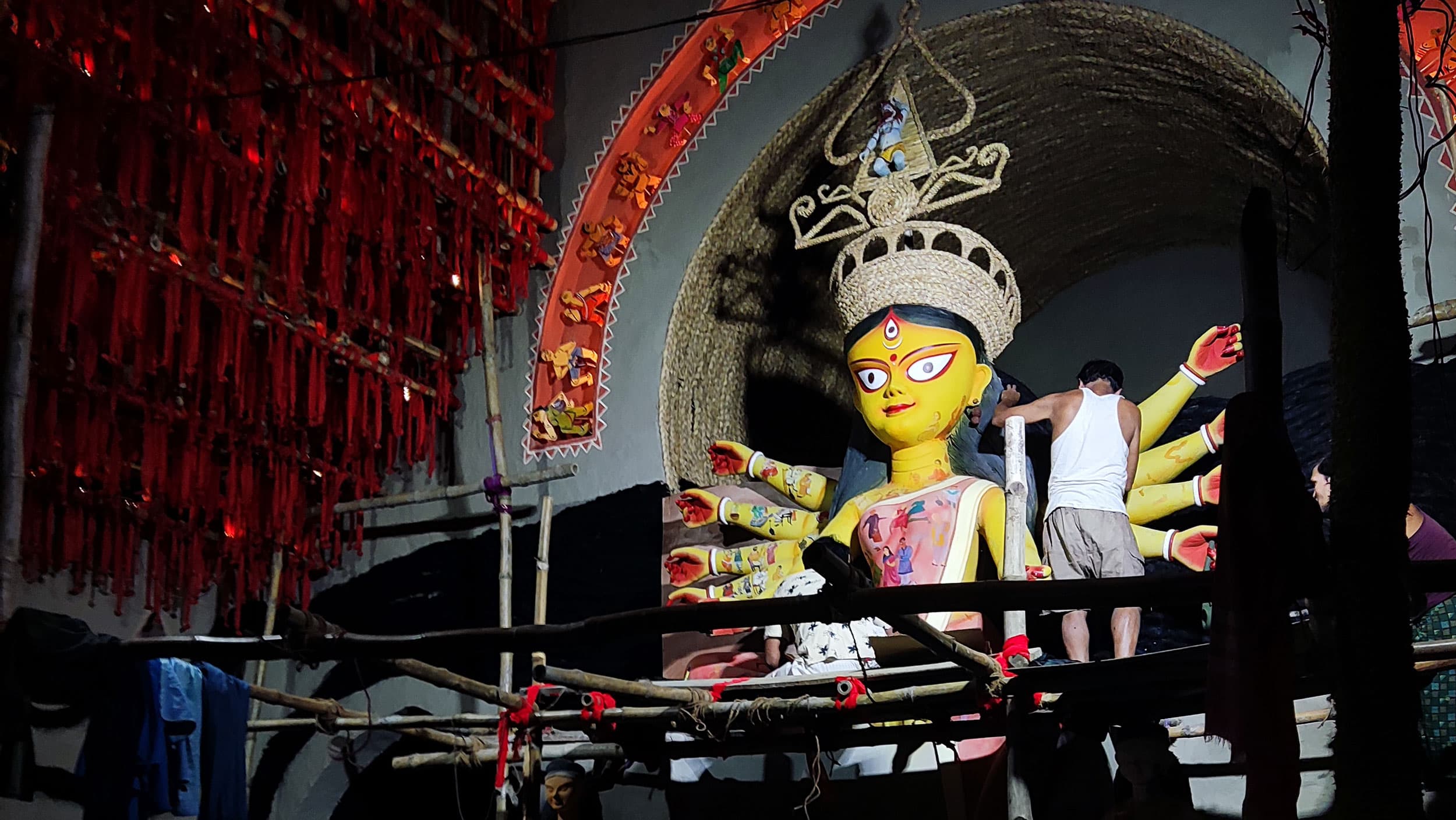 Kolkata's artists had to burn the midnight oil to get their Durga pujas ready early for the special art preview for visiting dignitaries. 