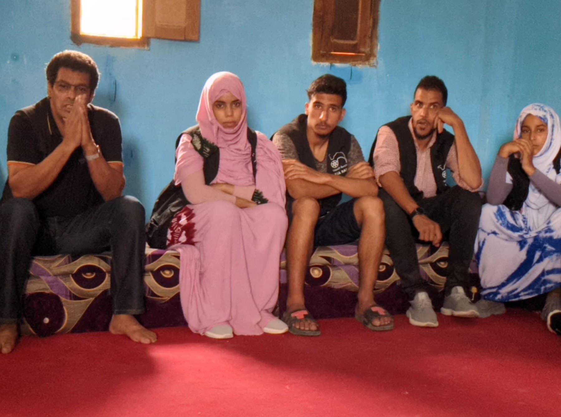 Tiba Chagaf, the Director of FiSahara and the Abidin Kaid Saleh Audiovisual School, speaks with some of his film students