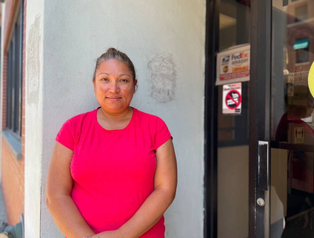 woman standing by wall