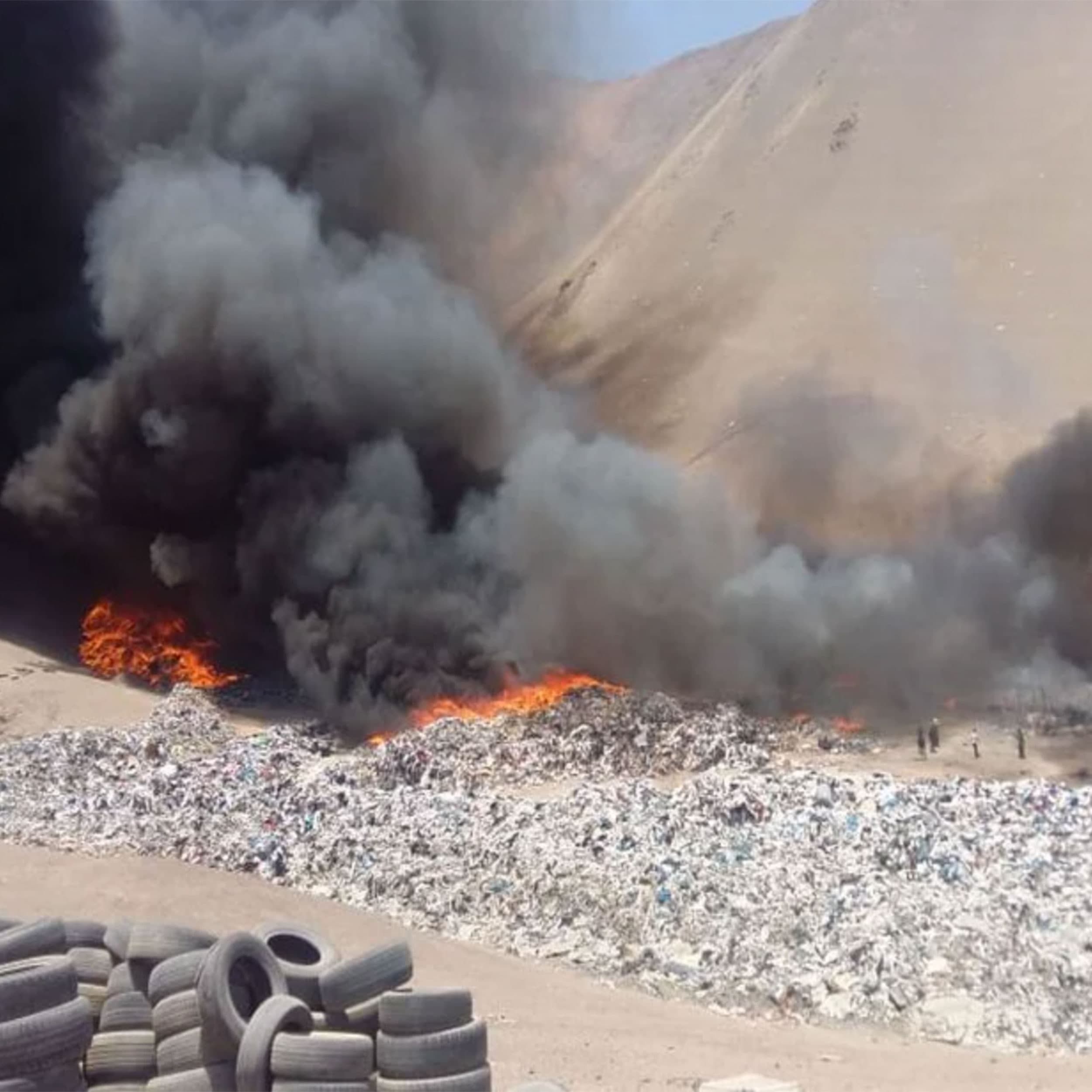 A fire at a dumping ground near the Paso de la Mula favela, in Alto Hospicio, Chile.