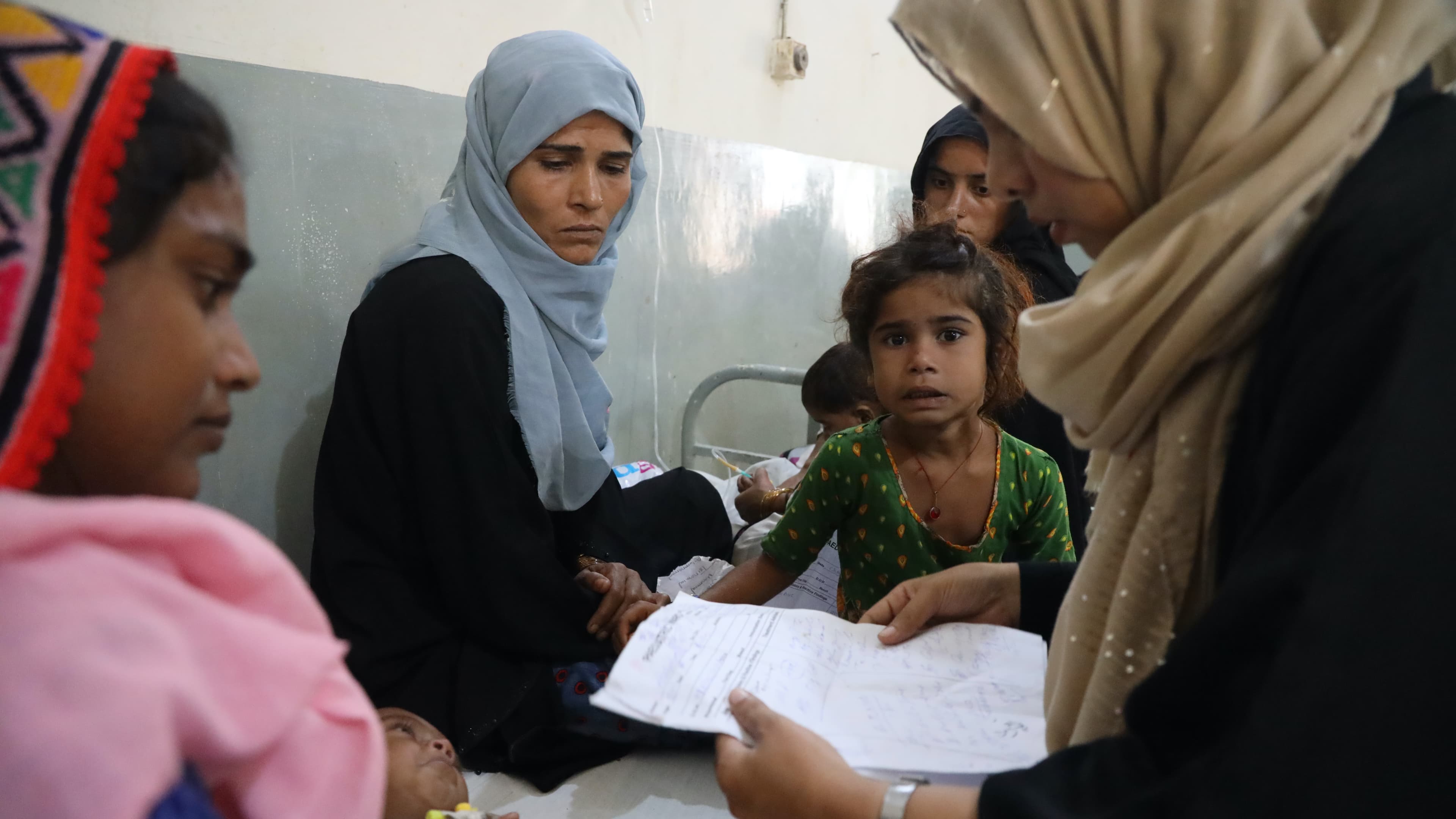 woman with other women and children