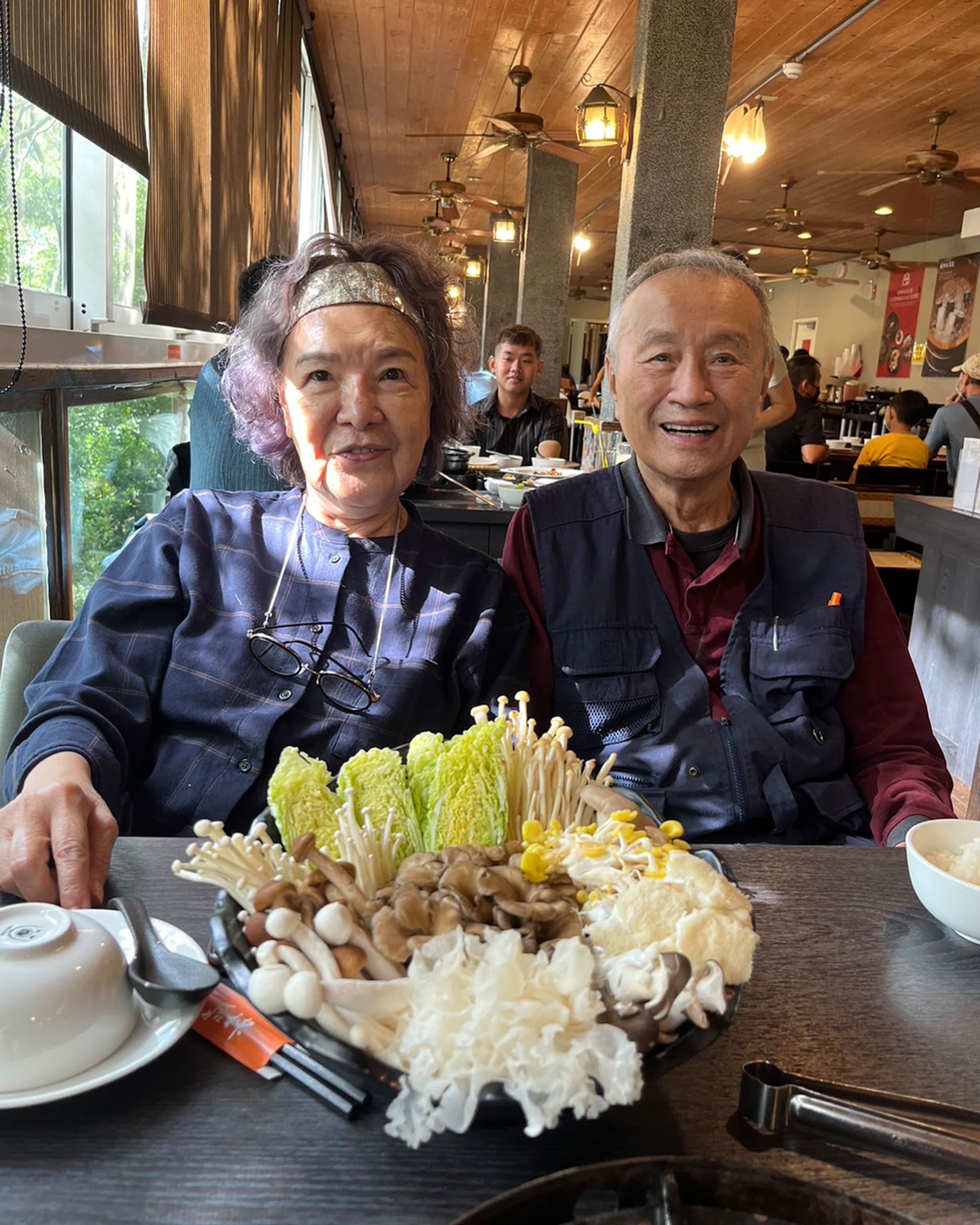 Jiang Du-Hsin, grandfather of the Jiang family (right), along with his wife, Bai Yue-Qin