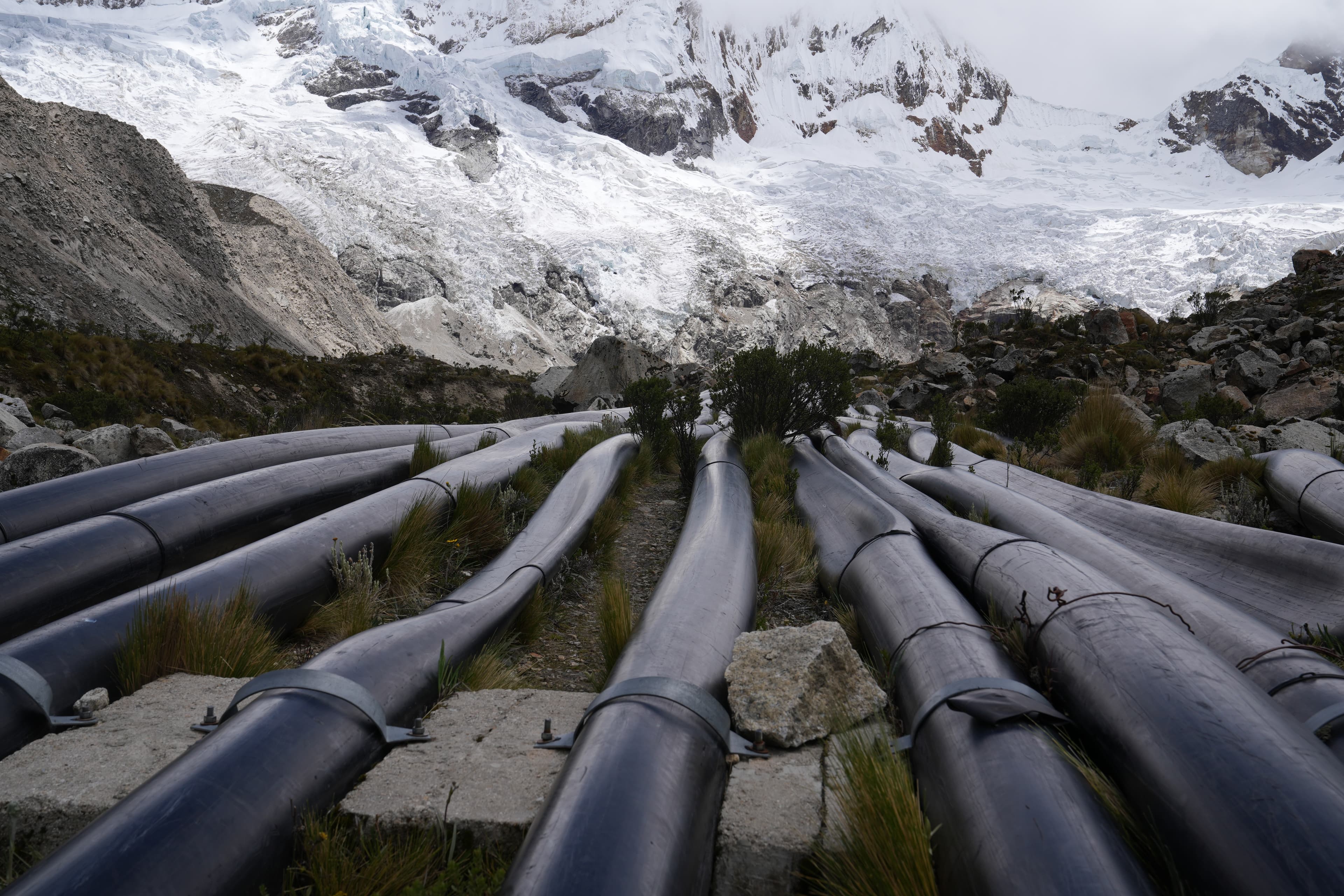 Plastic tubes siphon water out of Lake Palcacocha so that its levels don't rise too drastically.