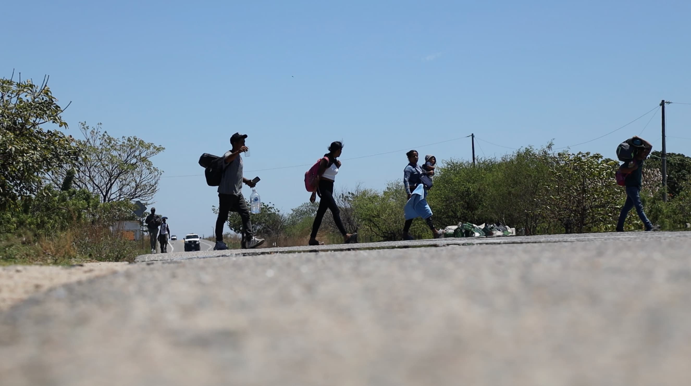 migrants walking