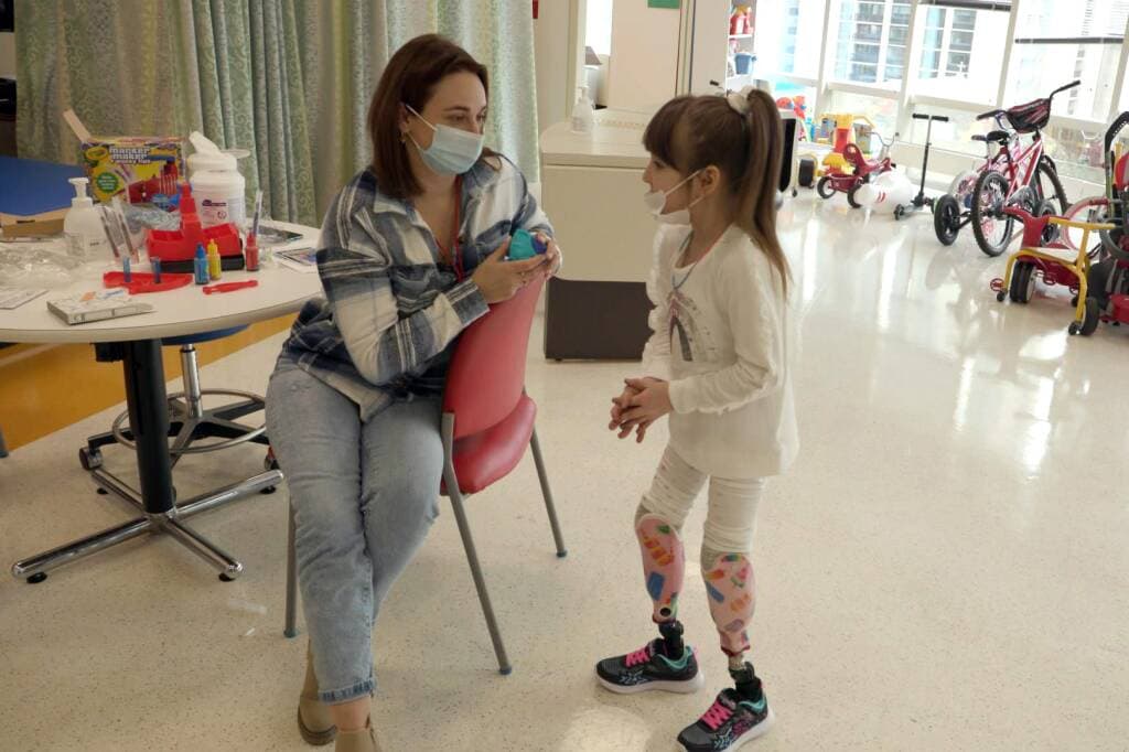 Daria Khatina and her goddaughter Karolina Daremyan during Karolina's final day at Shriners Children's Boston in March.