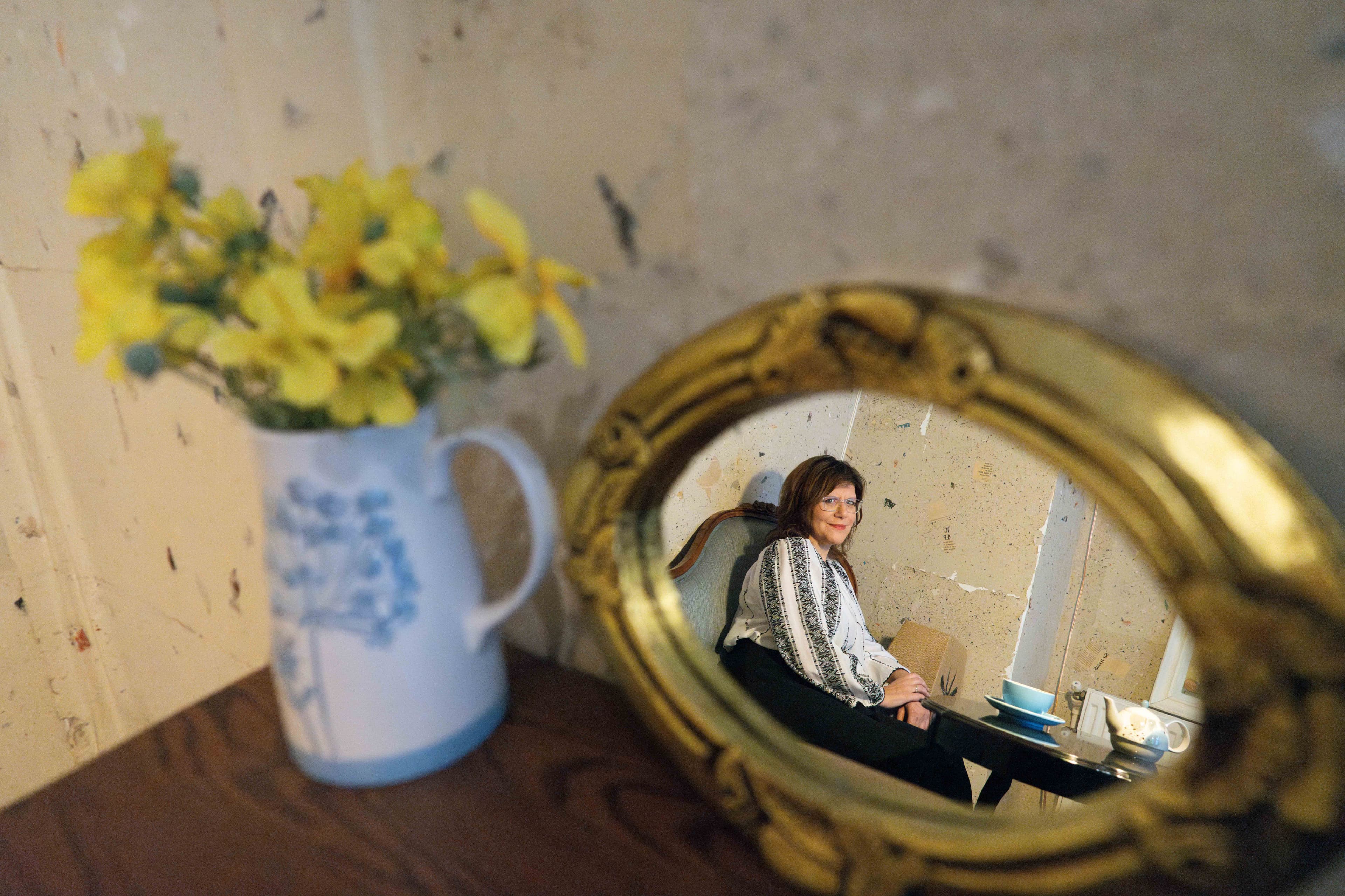 mirror with woman in reflection