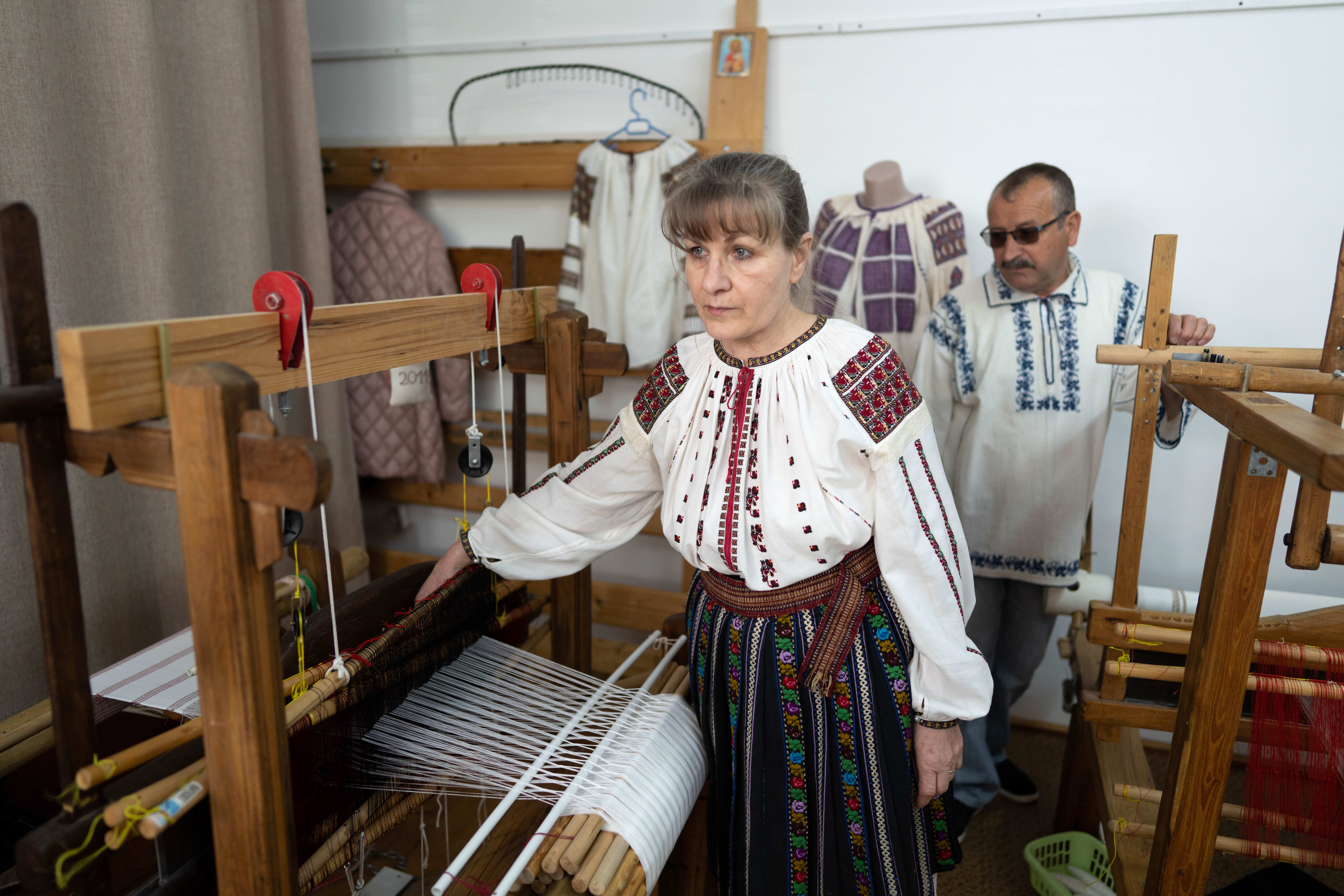 woman and man near loom