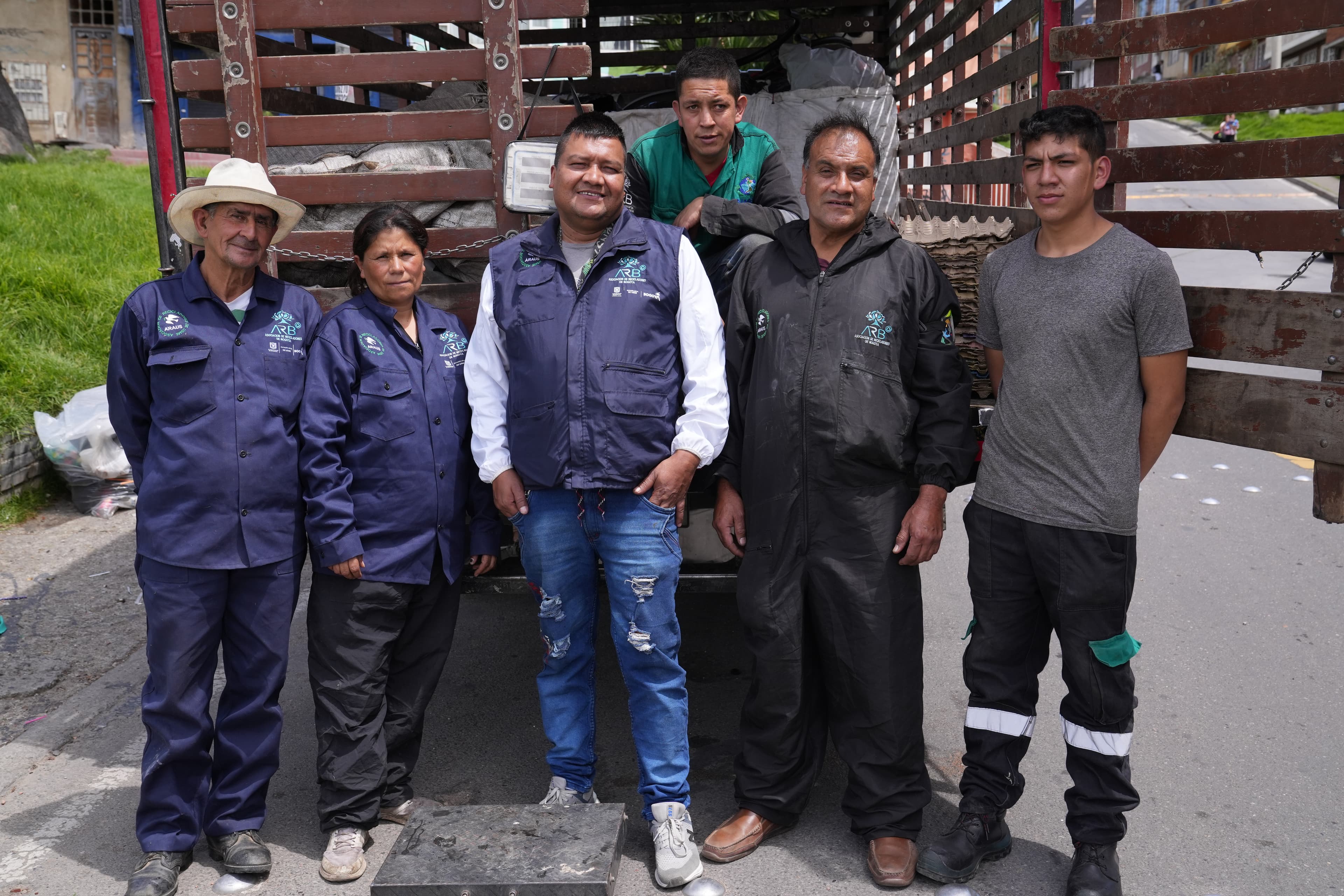 men in front of truck