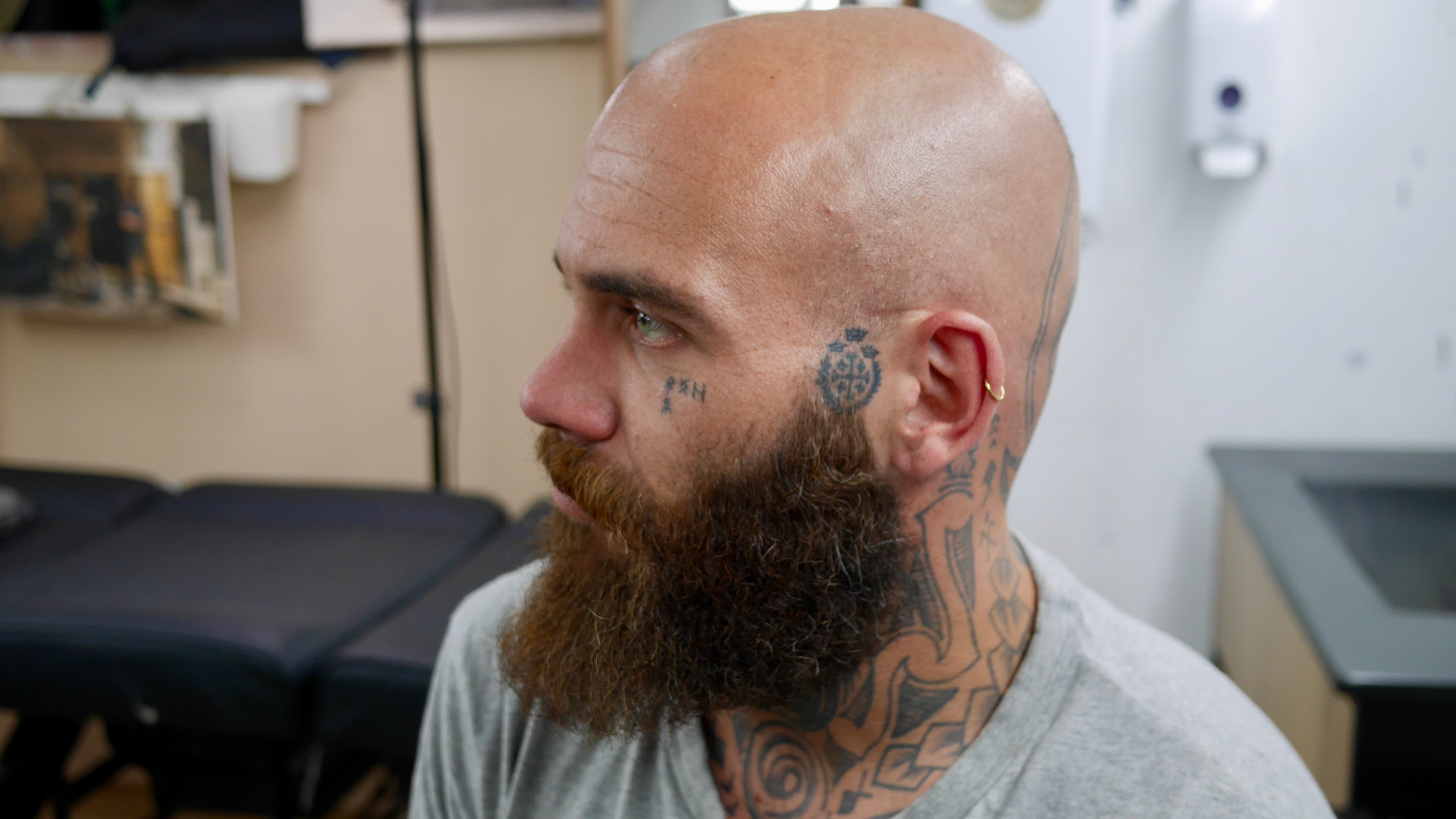 man with shaved head