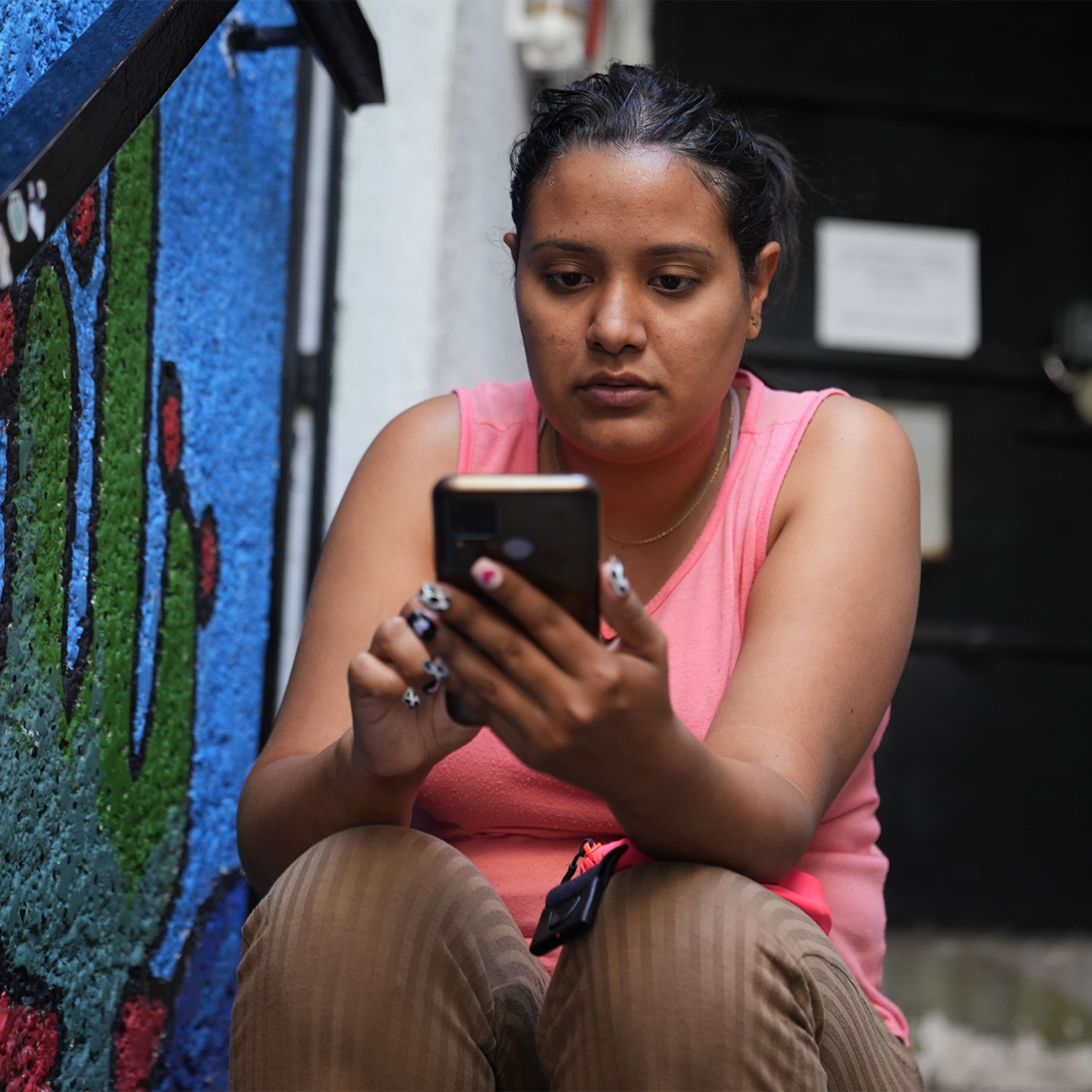 Nathaly Villareal logs into CBP One, a US government app that schedules appointments at border posts for people who want to claim asylum. But getting an appointment is far from easy.