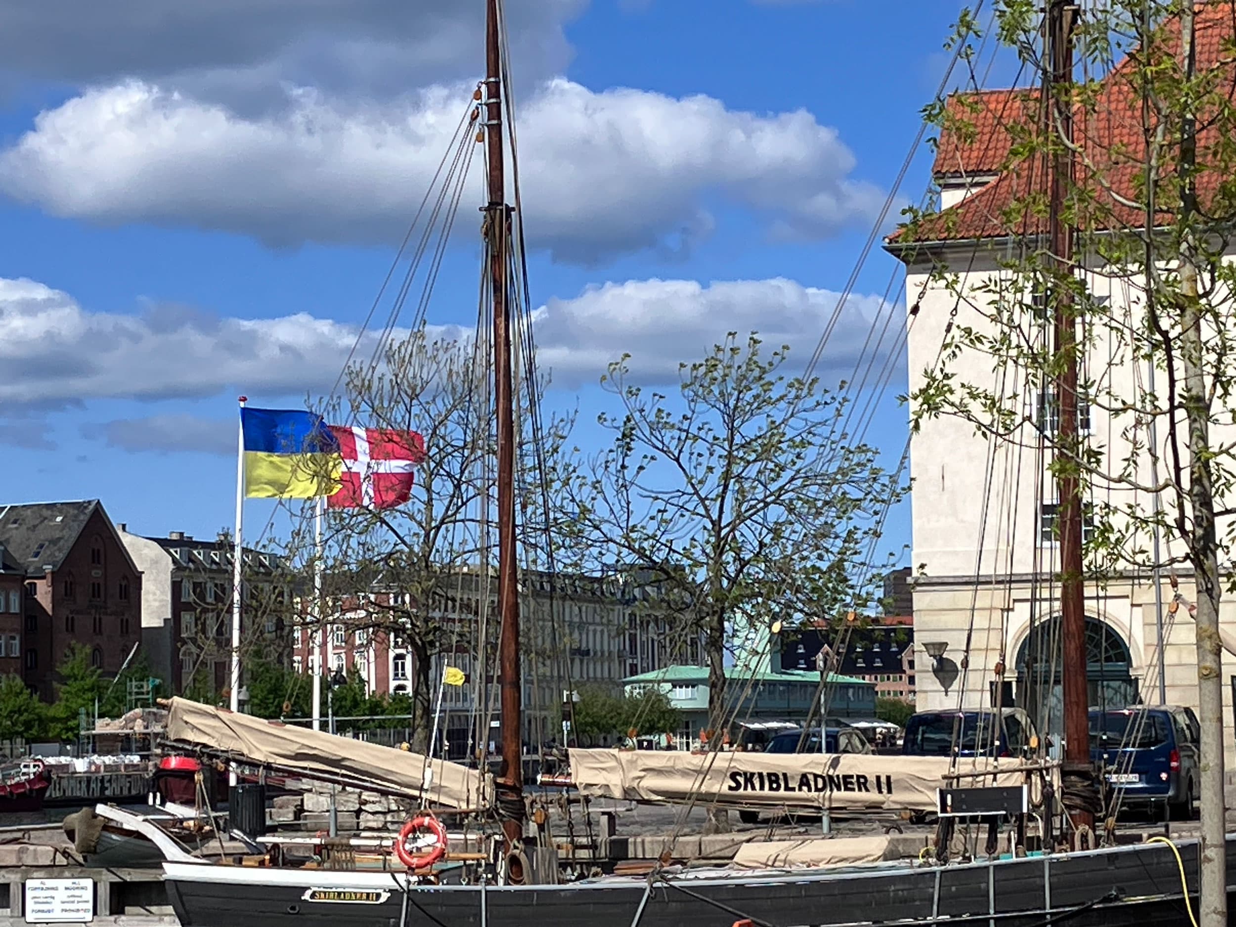 Ukrainian and Danish flags wave together in front of Ukraine House in Copenhagen, Denmark, May 17, 2023.