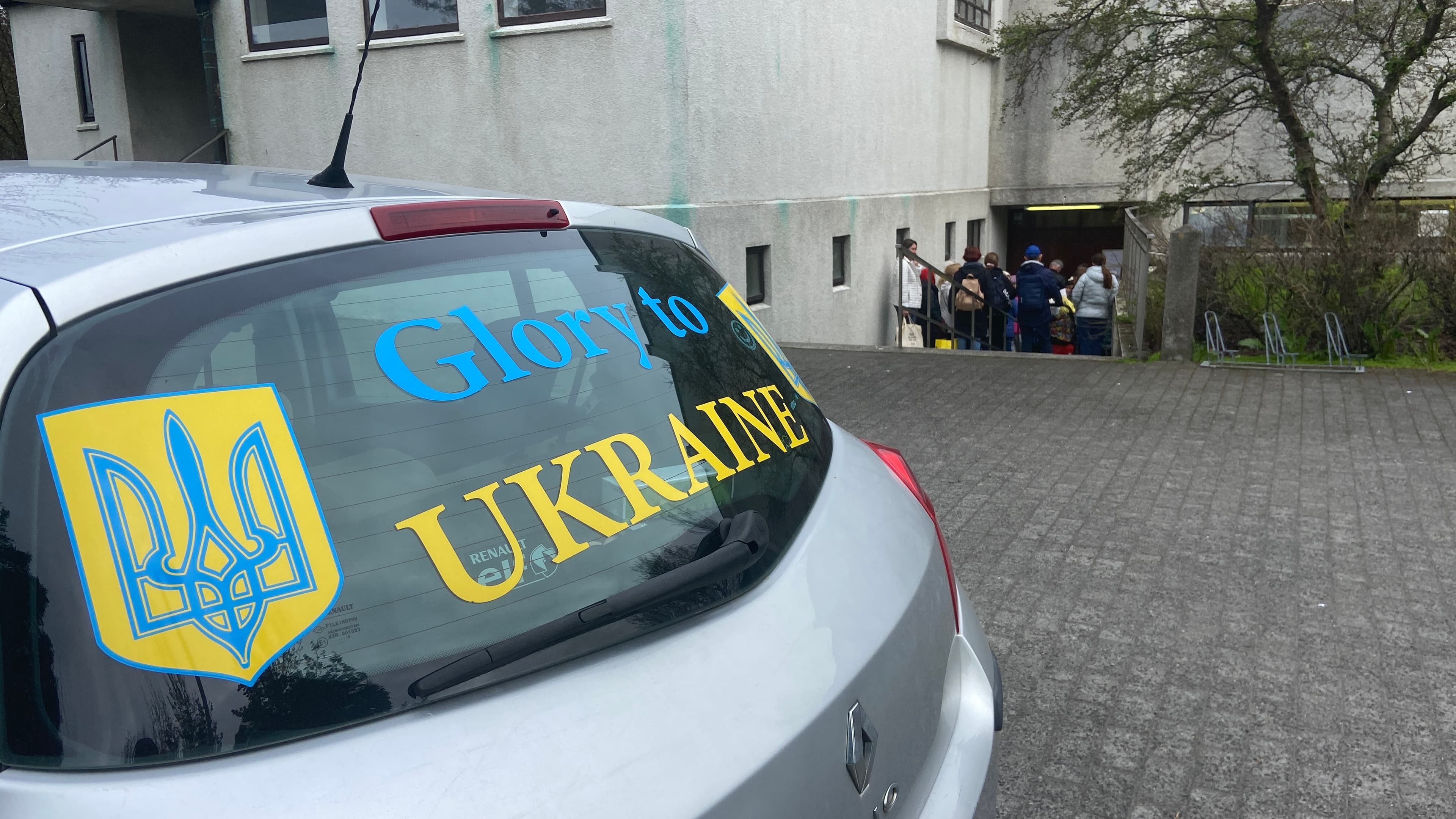 a car displaying a pro-Ukraine sticker