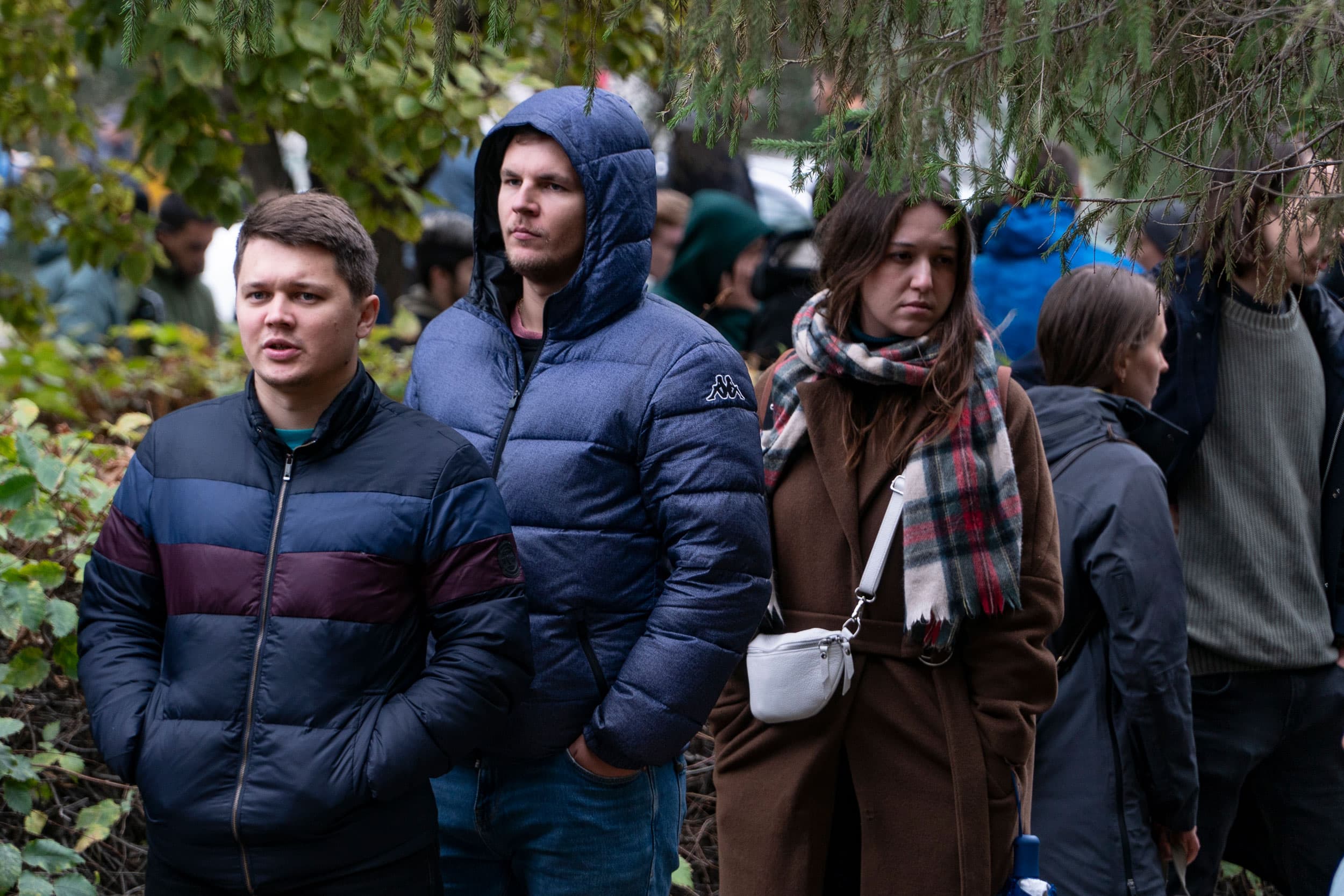 Russians lineup to get a Kazakh registration after crossing the border into Kazakhstan from the Mariinsky border crossing, about 250 miles south of Chelyabinsk, in Russia, to Kazakhstan in Uralsk, Wednesday, Sept. 28, 2022. 