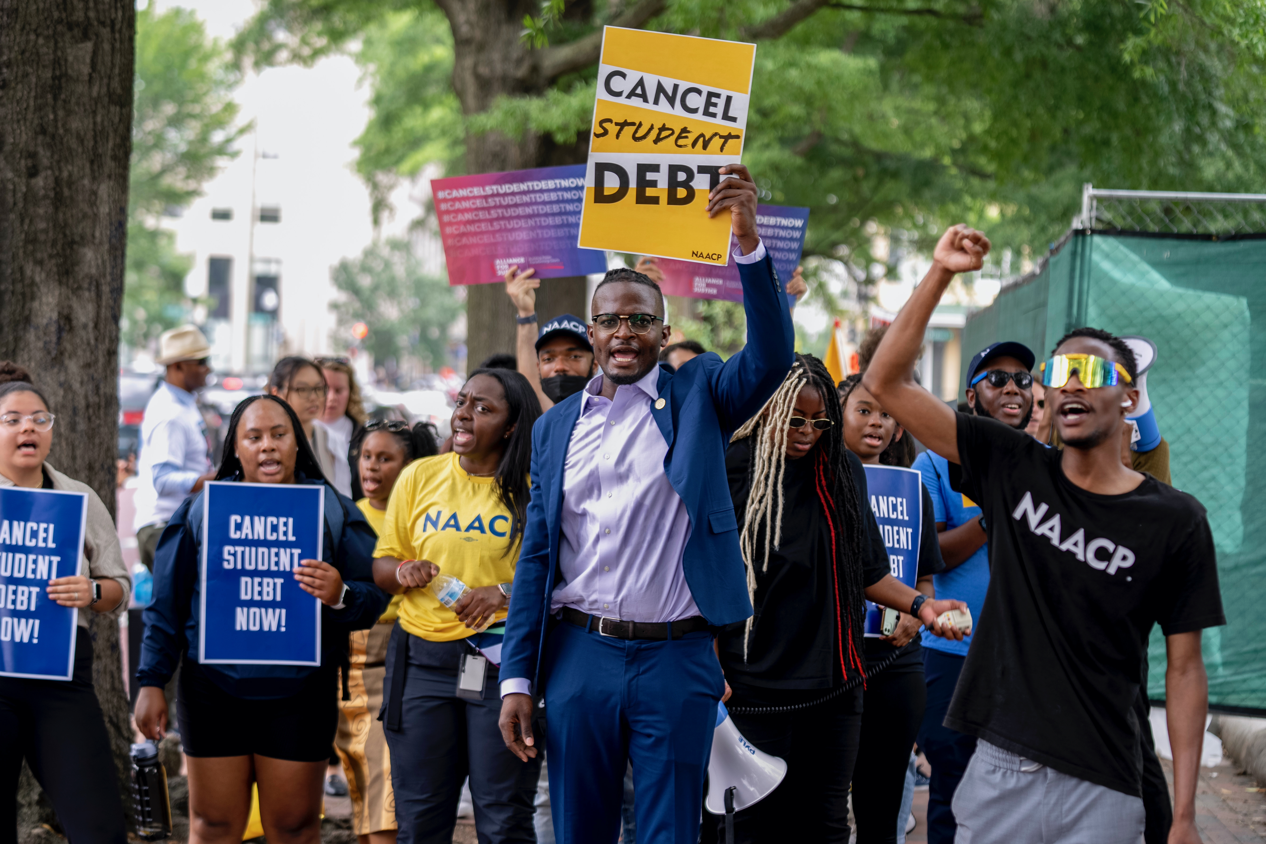 People demonstrate in Lafayette Park across from the White House in Washington, June 30, 2023.