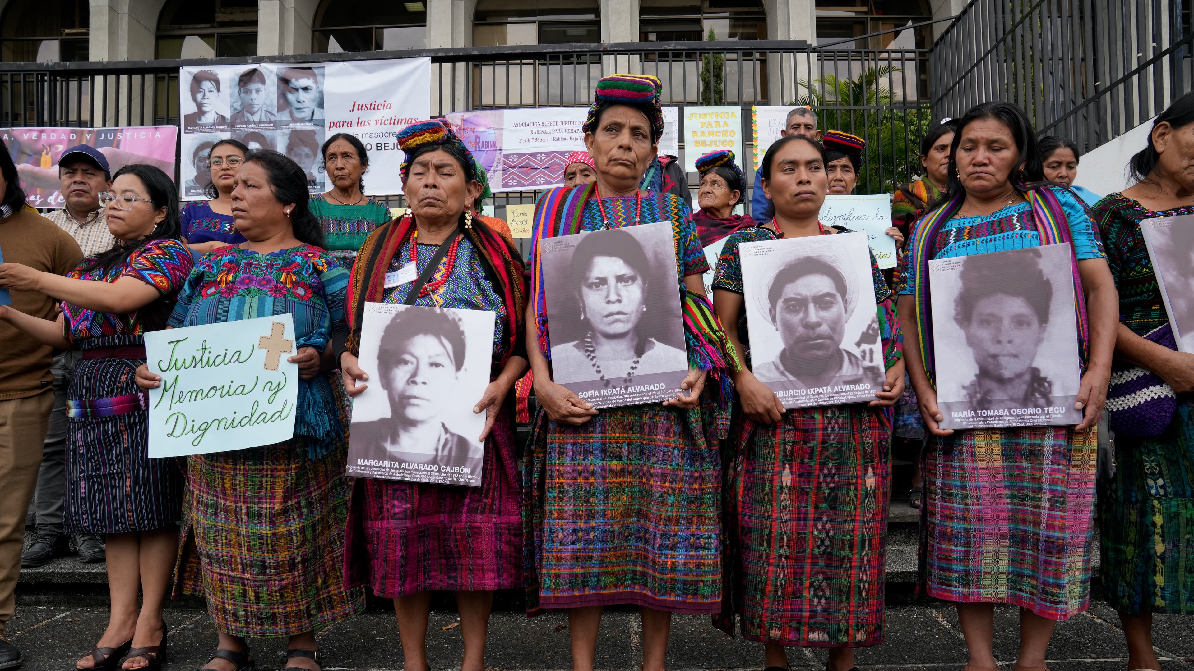 people in line with signs