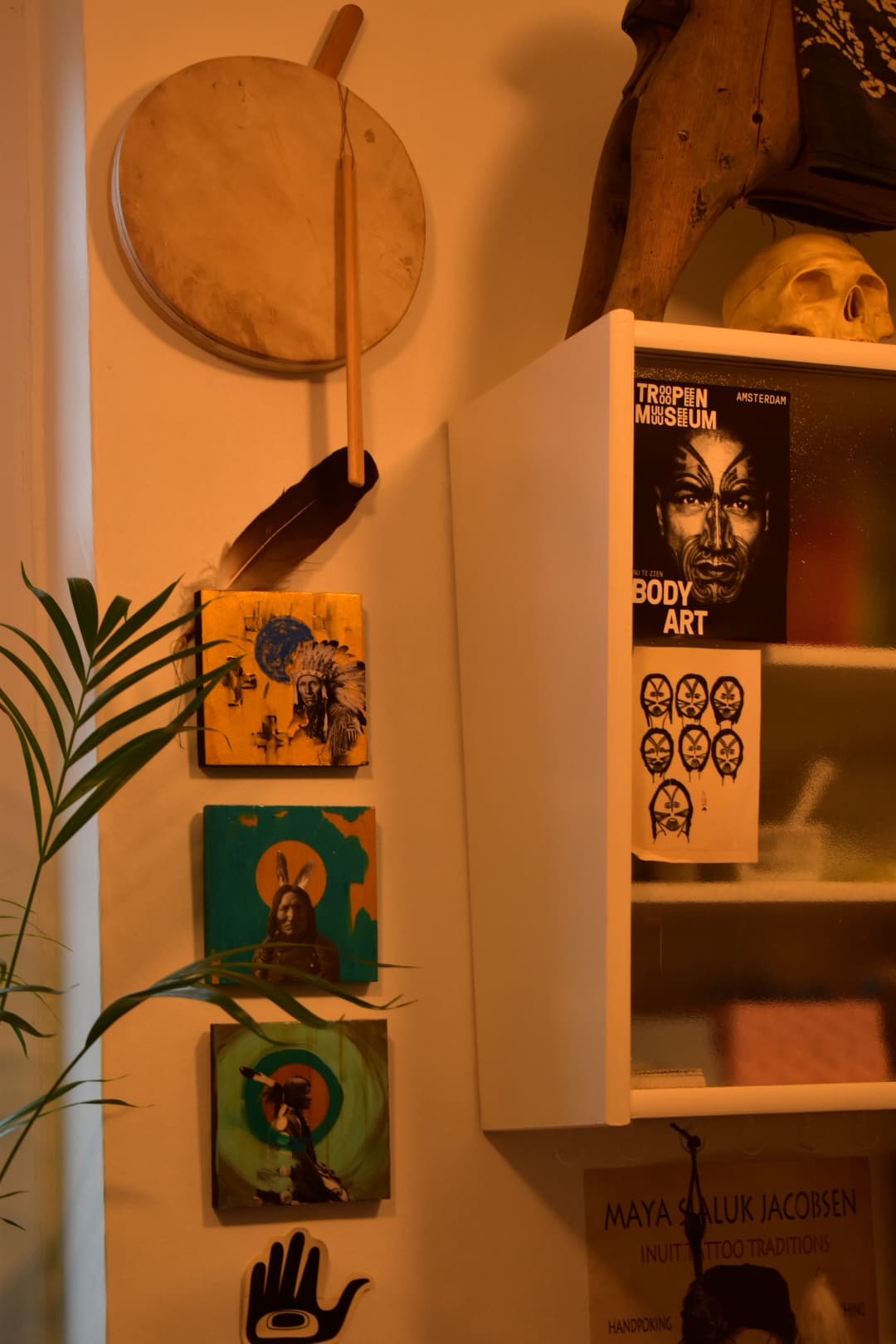 A traditional Inuit drum hangs on the wall of Maya Sialuk Jacobsen’s tattoo studio in Svendborg, Denmark, Dec. 9, 2022.