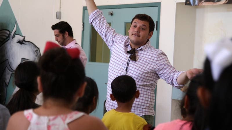 Mariachi summer camp’s program director, Jose Soto, conducts about 50 campers during a recent practice.