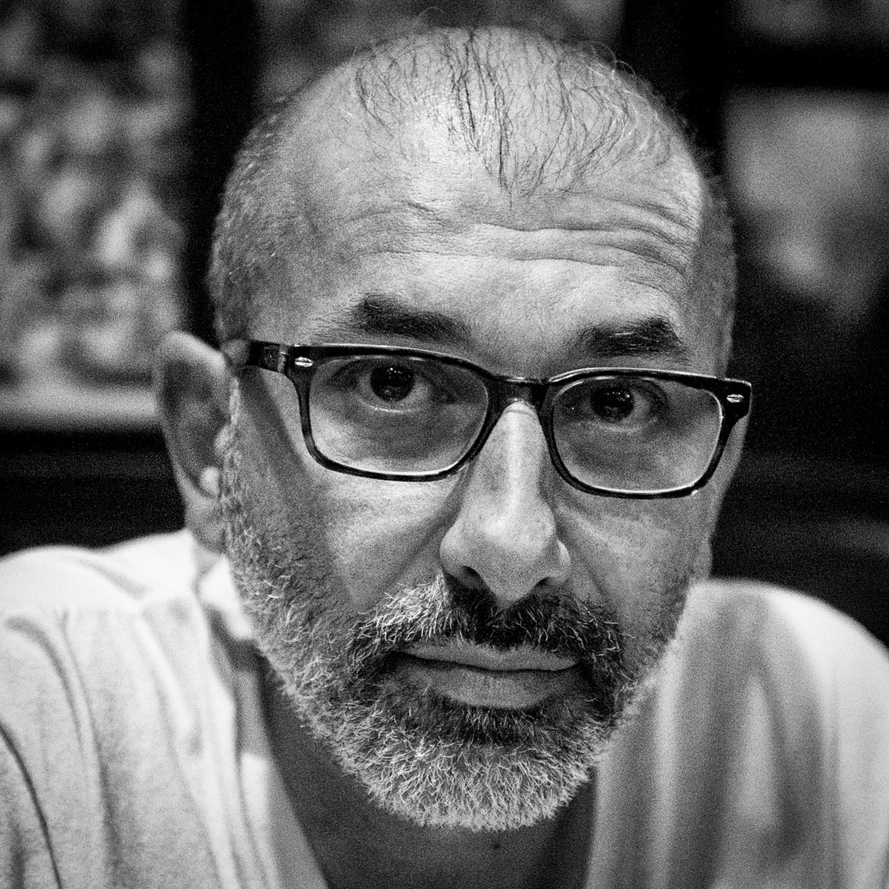 Portrait of man in glasses, black and white