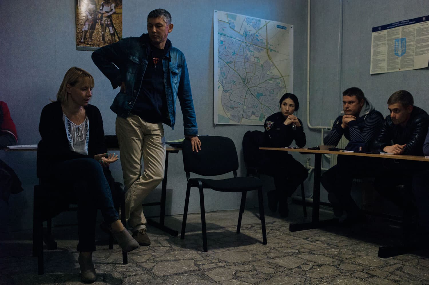 Sveta Moroz from NGO Svitanok Club educates Borispol's patrol officers on modern approaches to dealing with drug users.