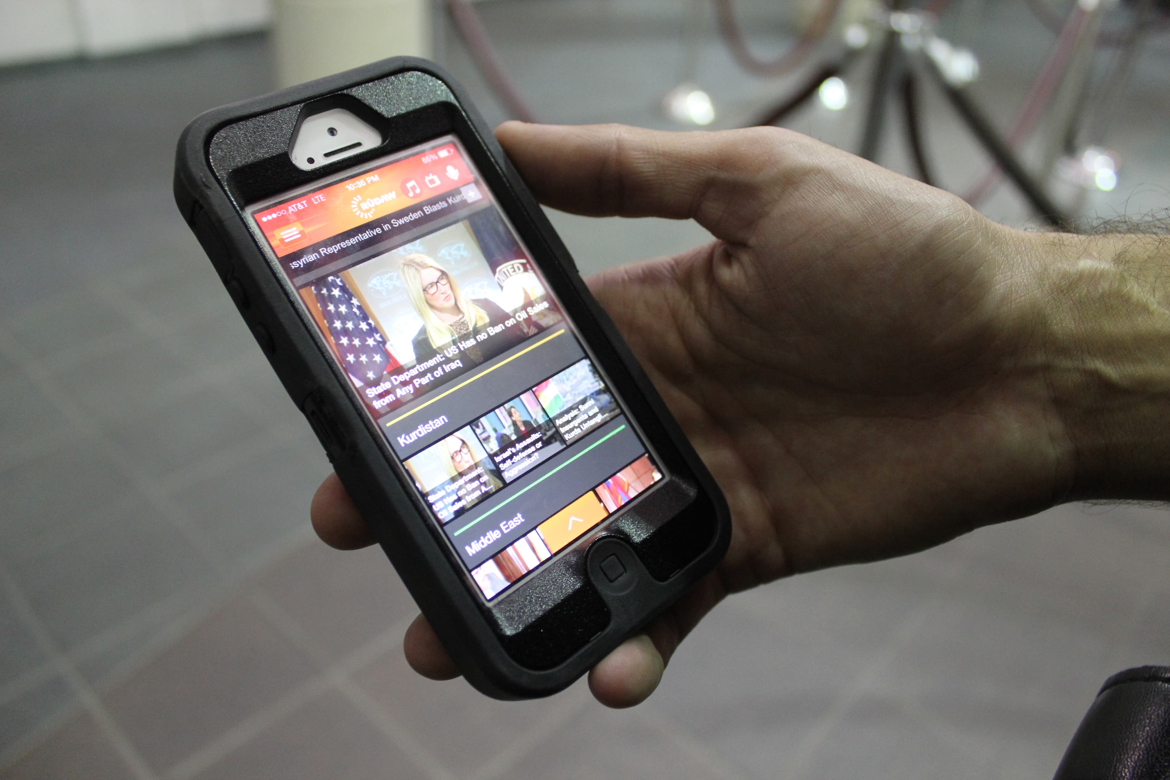 Jiyayi Suleyman, a Nashville police officer born in Iraq’s Kurdish region, checks Rudaw, the Kurdish news agency. His uncle is a ranking Kurdish peshmerga fighter in northern Iraq, battling Islamic State fighters.