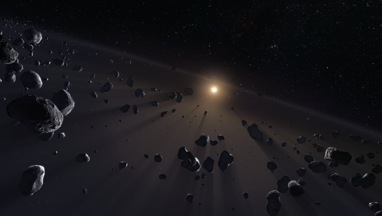 An artist’s rendering of icy objects in the Kuiper Belt.