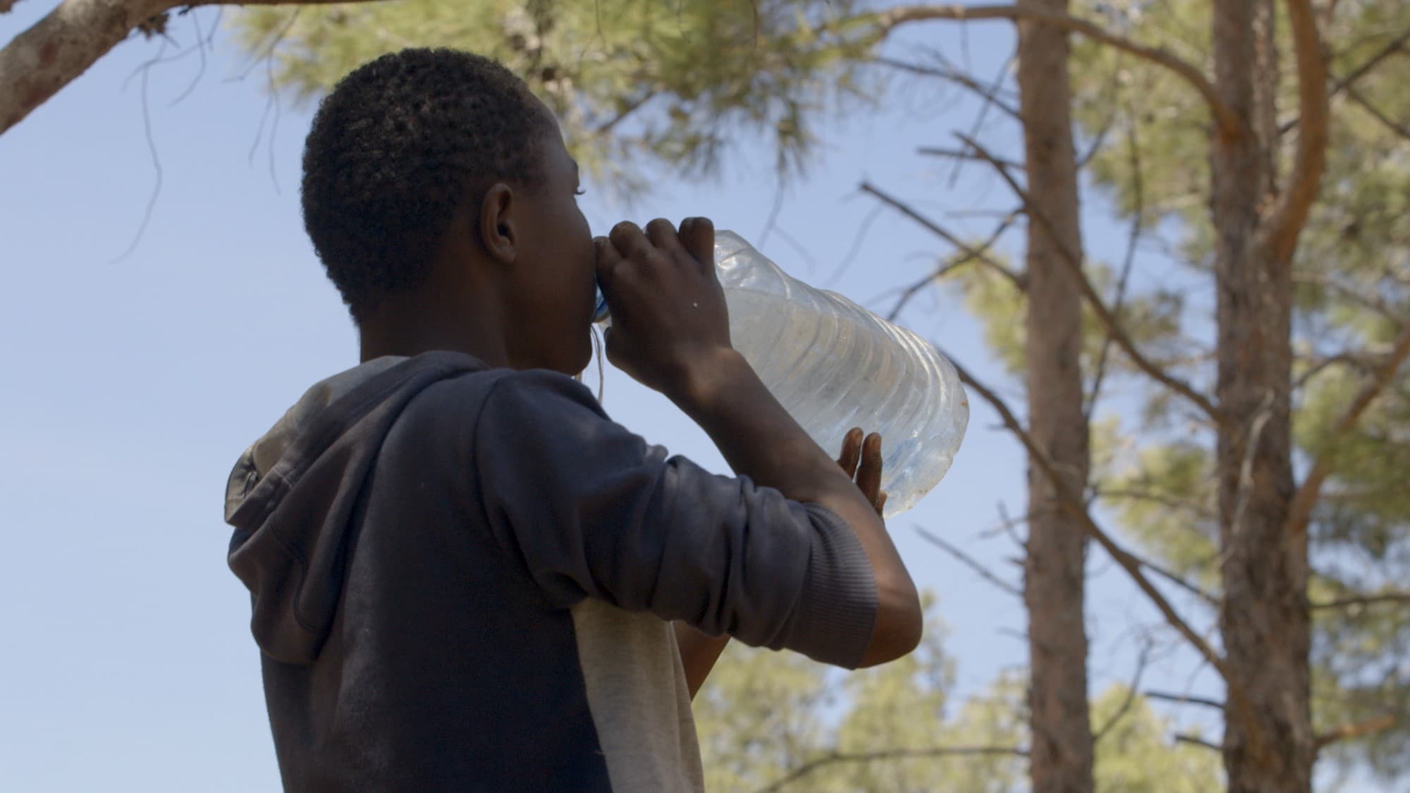 Bambino, the youngest in his ‘brotherhood,’ is one of the lucky ones who ‘succeeded’ in crossing the border between Morocco and the Spanish enclave of Melilla.